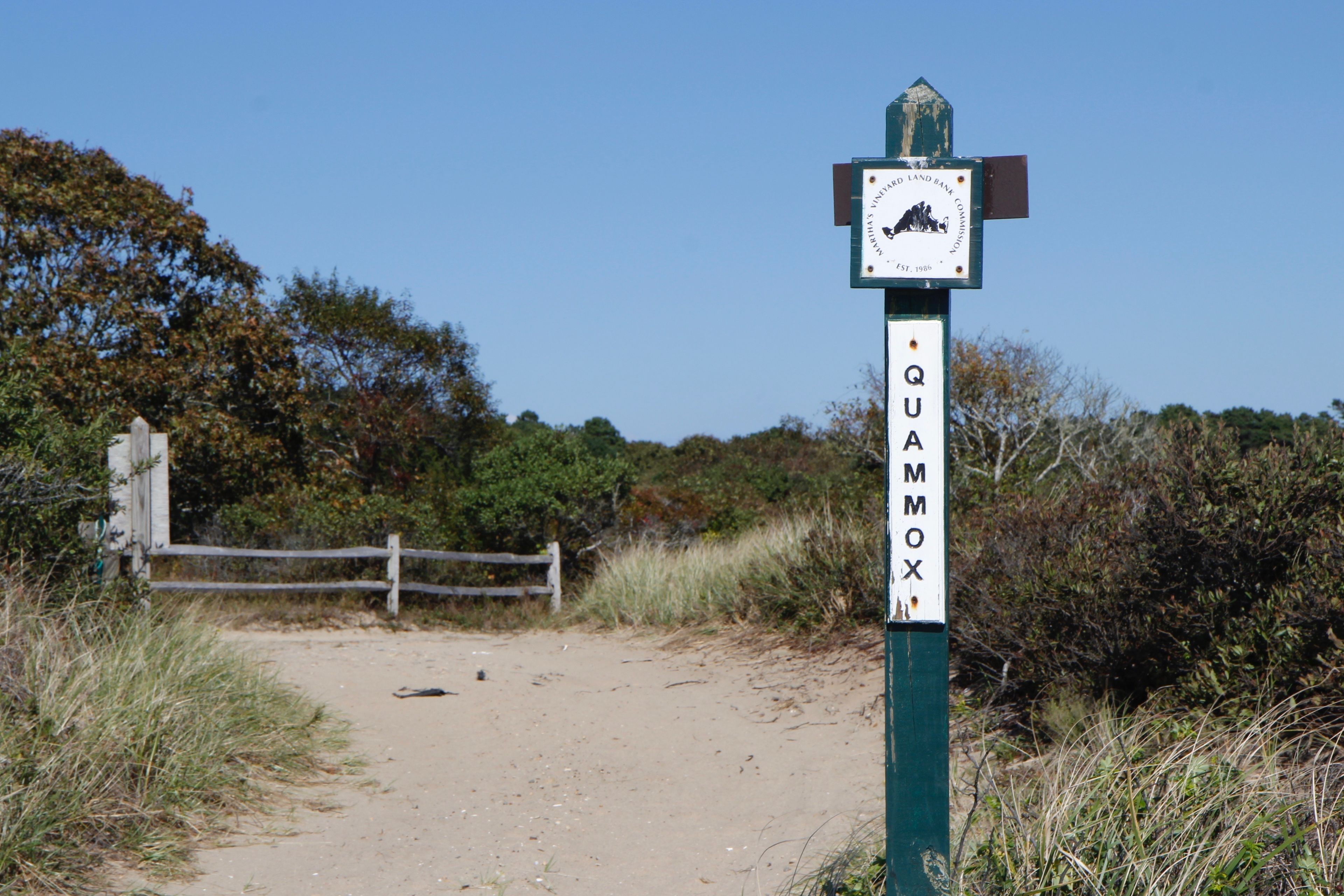 sign at beach near boat launch area