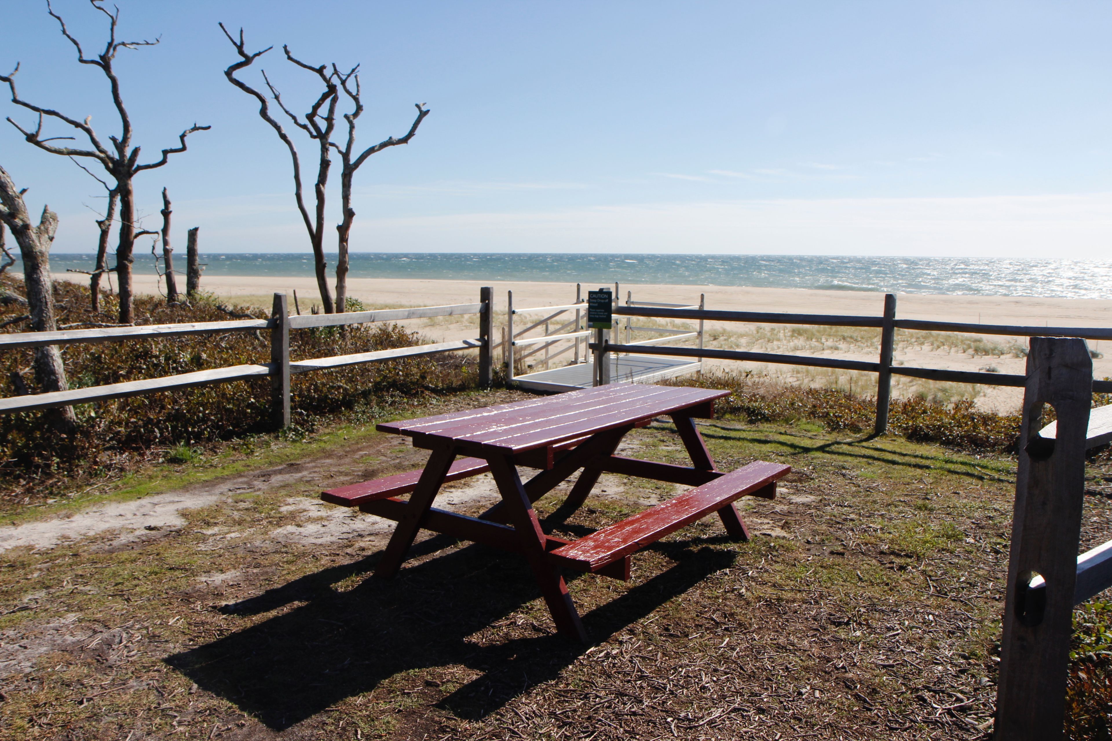 picnic table near stairs and view