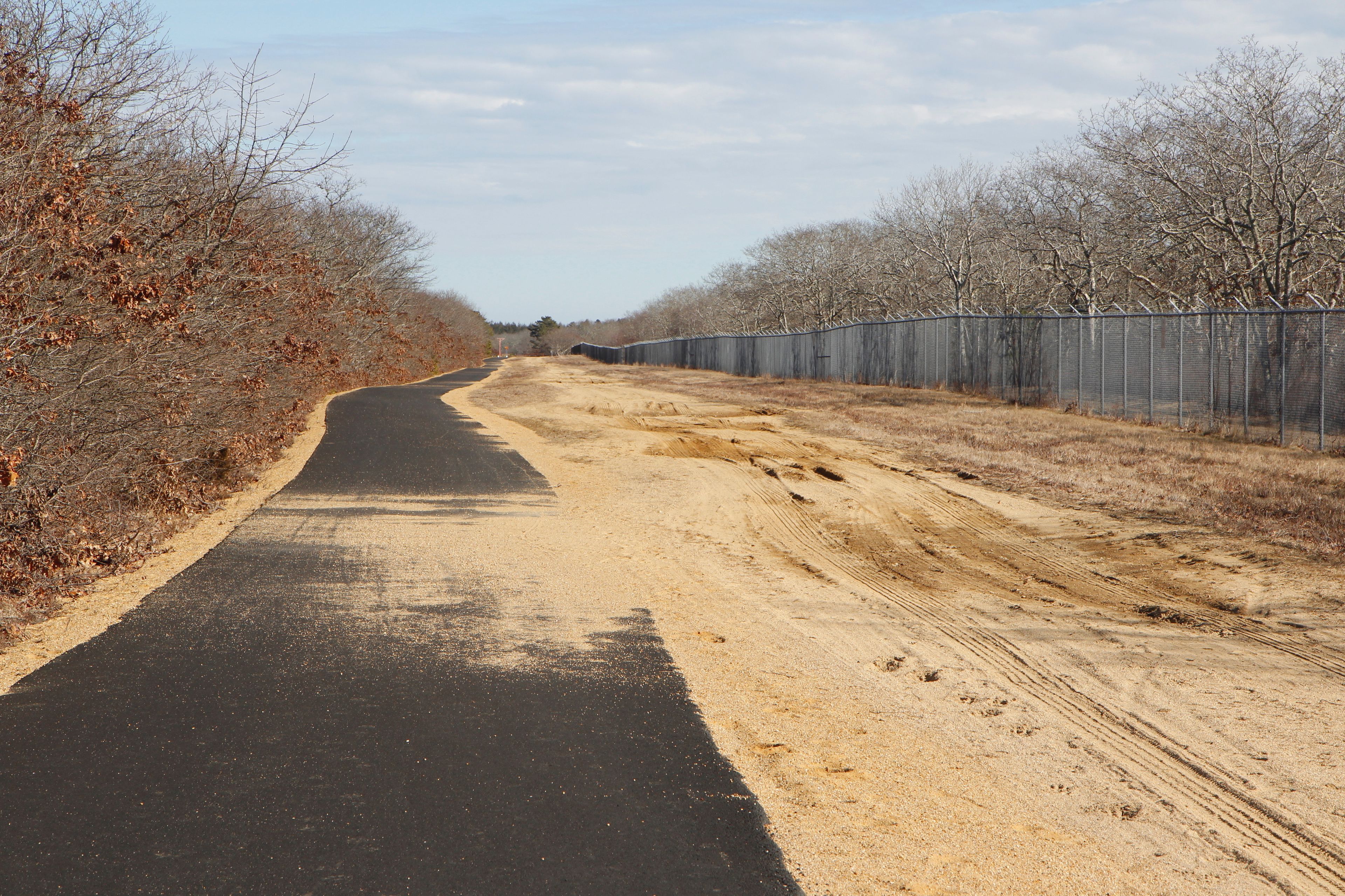 along northern edge of airport