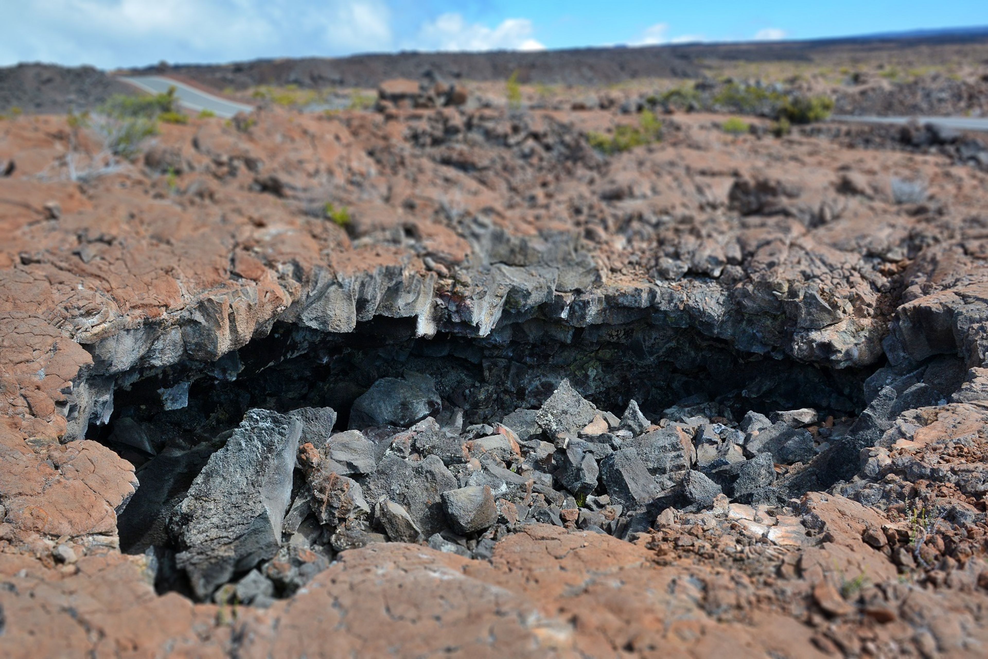 Lava tubes can be seen just off the road.