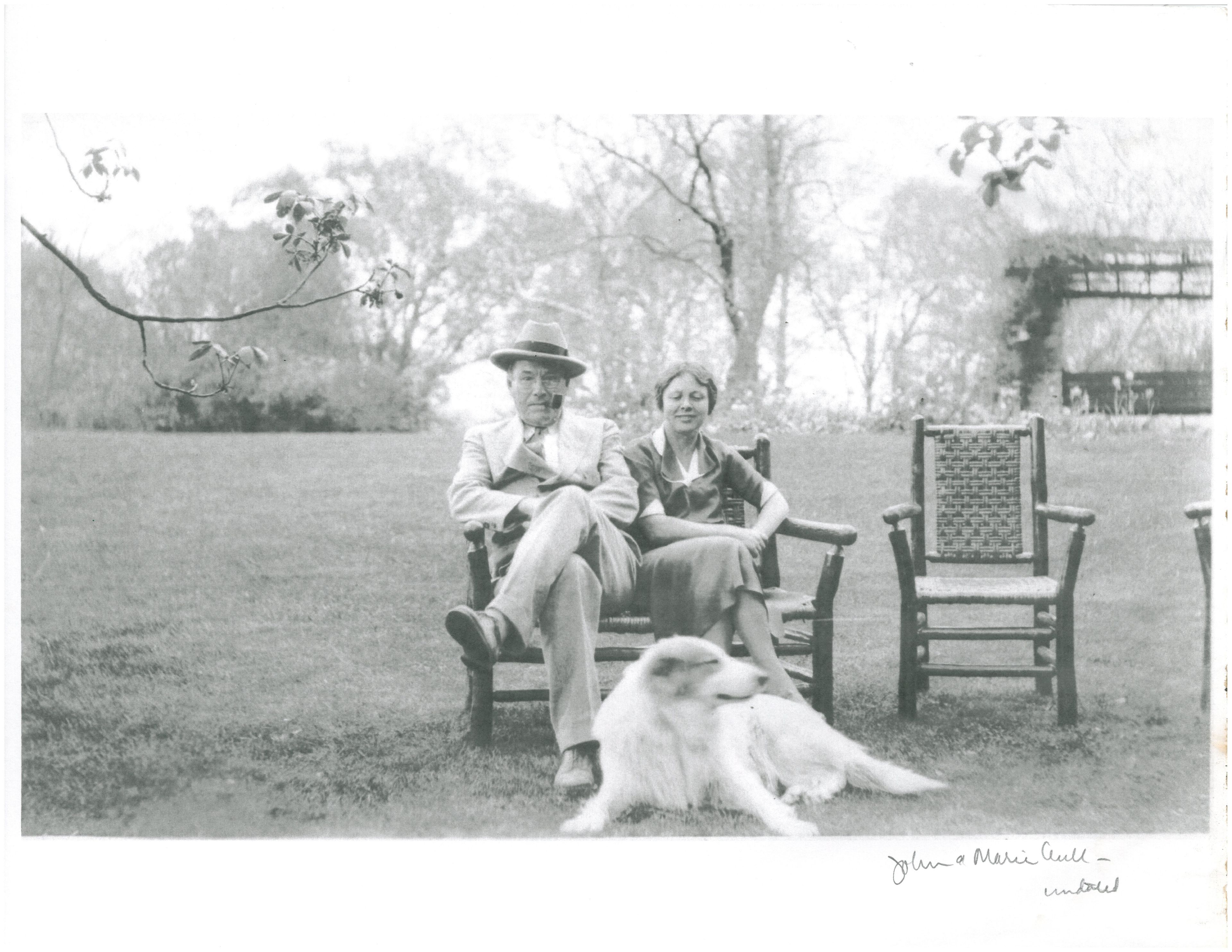 John and Marie Aull enjoy the garden in the 1920s.