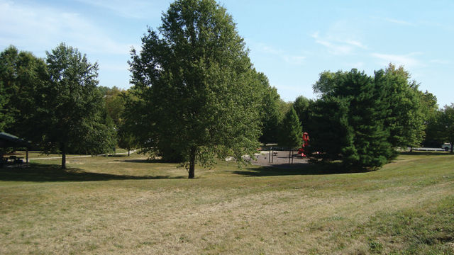 Rev Ernest D Butler Park trees, greenspace, and playground