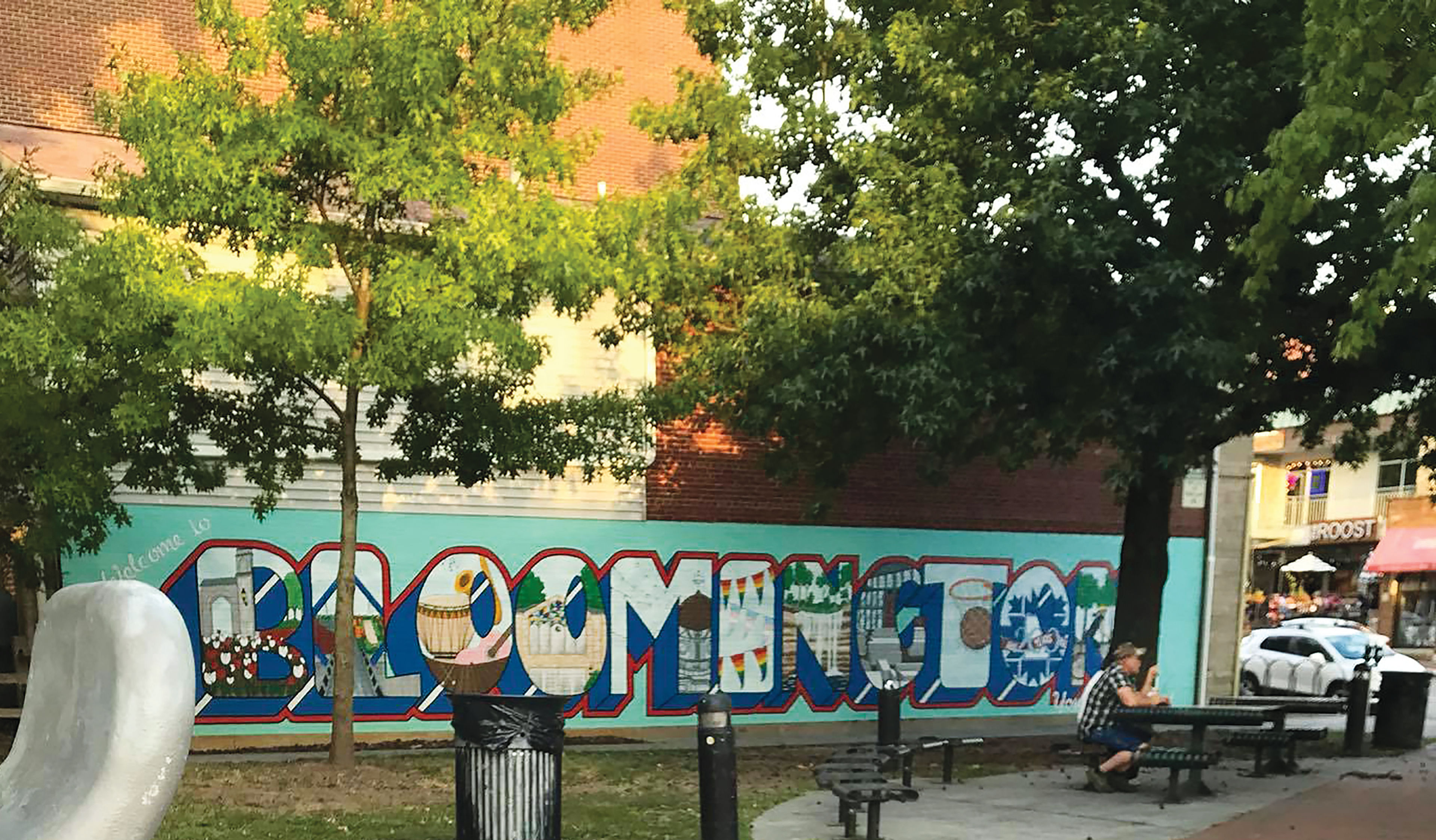 A public art mural and places to sit in Peoples Park