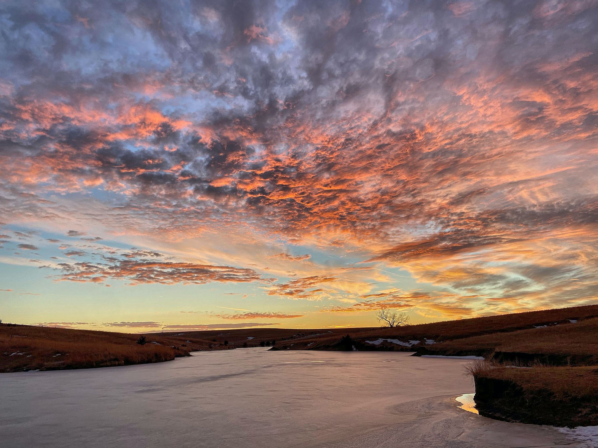 Nebraska, USA, sunset with clouds.