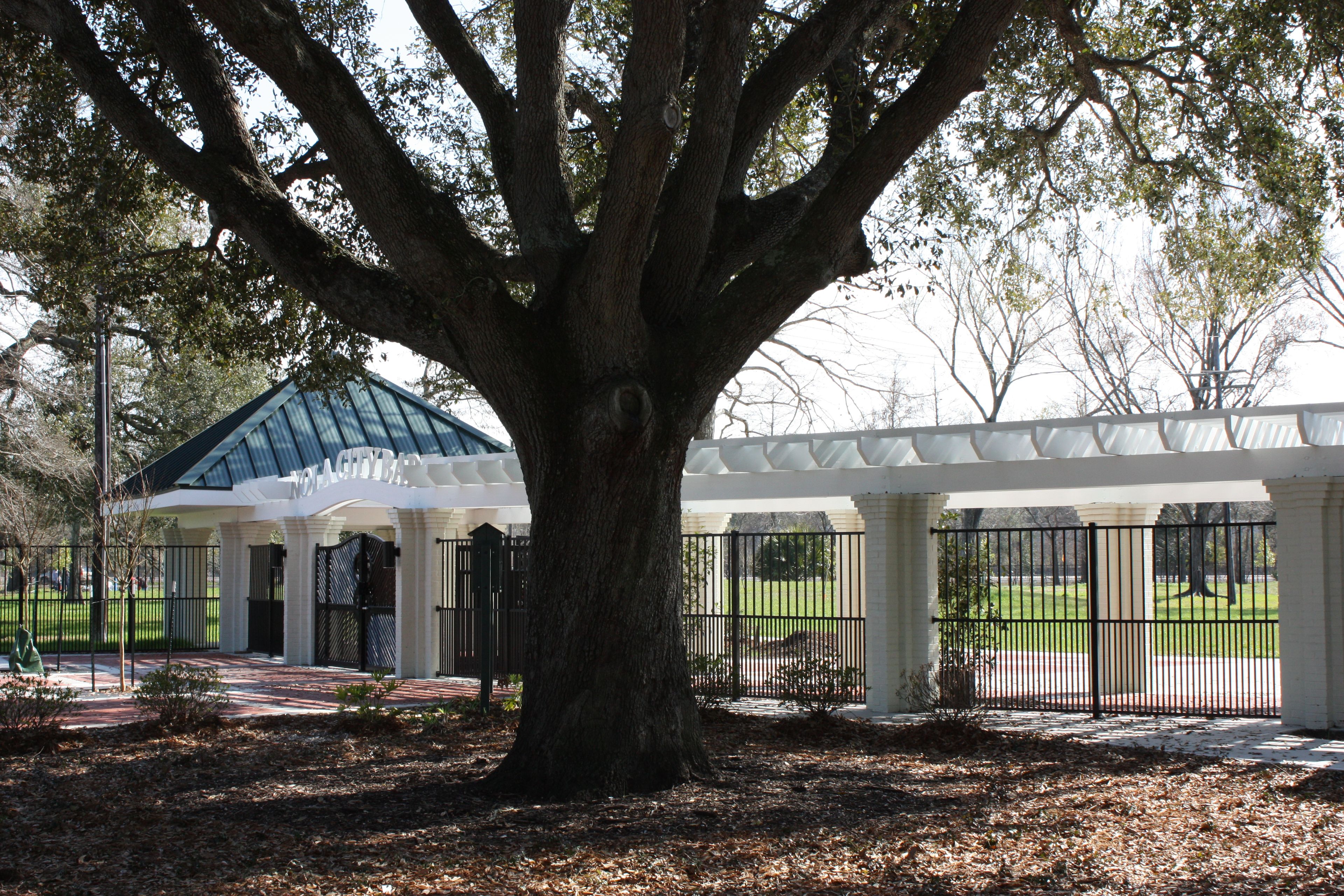 Side angle of main gate at NOLA City Bark Dog Park