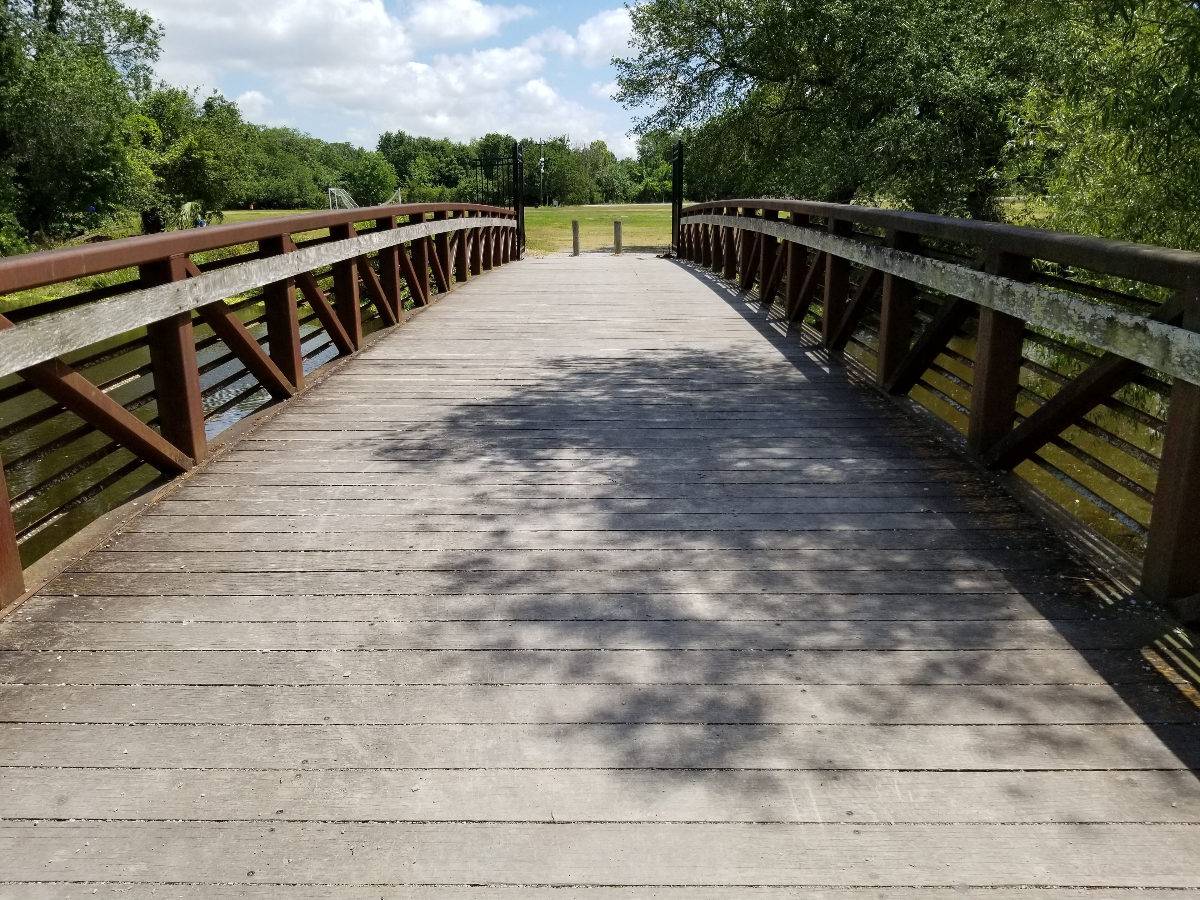 Walking across Scout Island's Bridge