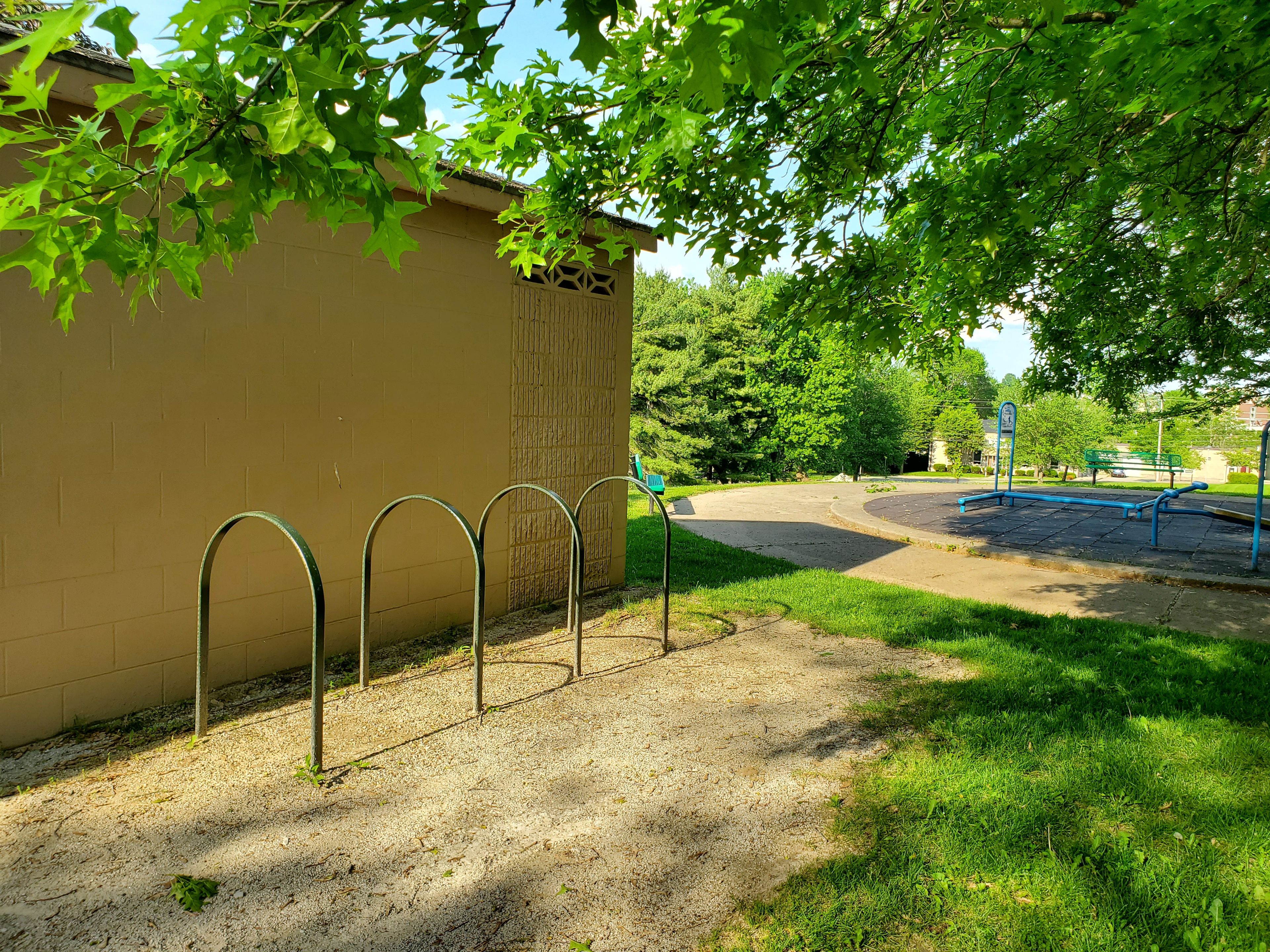 Butler Park restrooms, bike rack, and fitness station