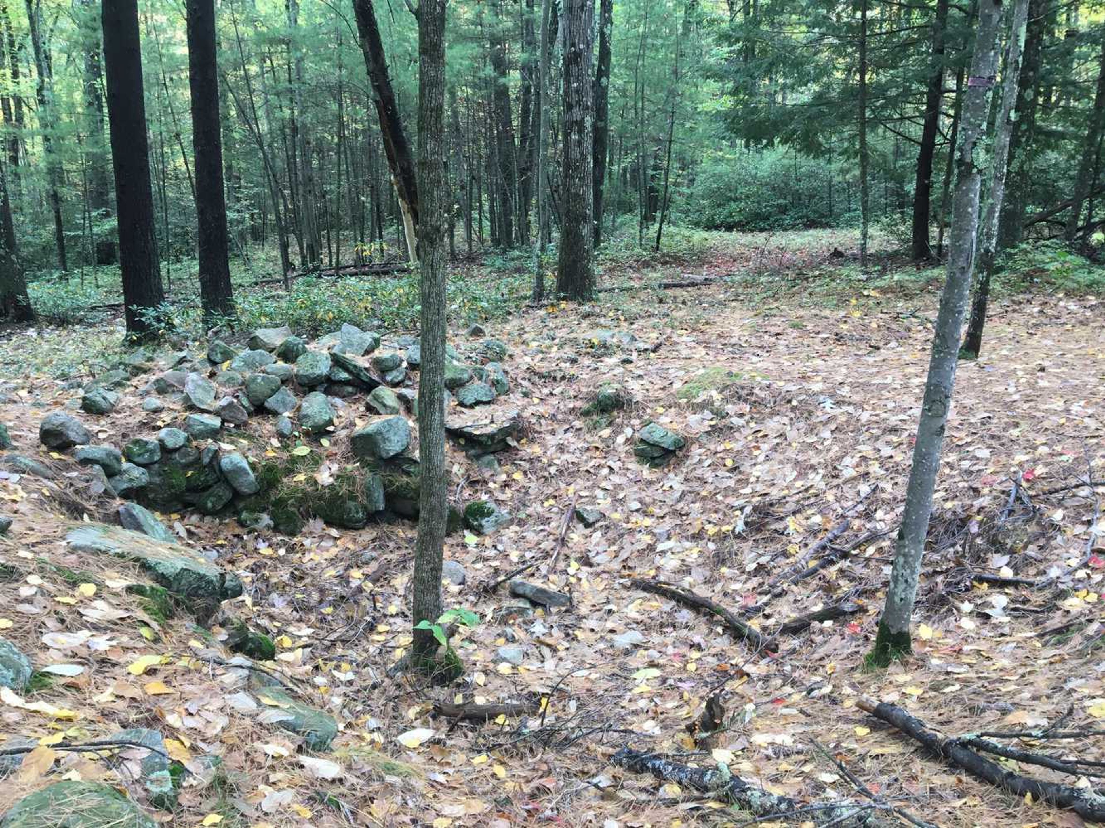 Remnants of a stone foundation can be viewed at the site.