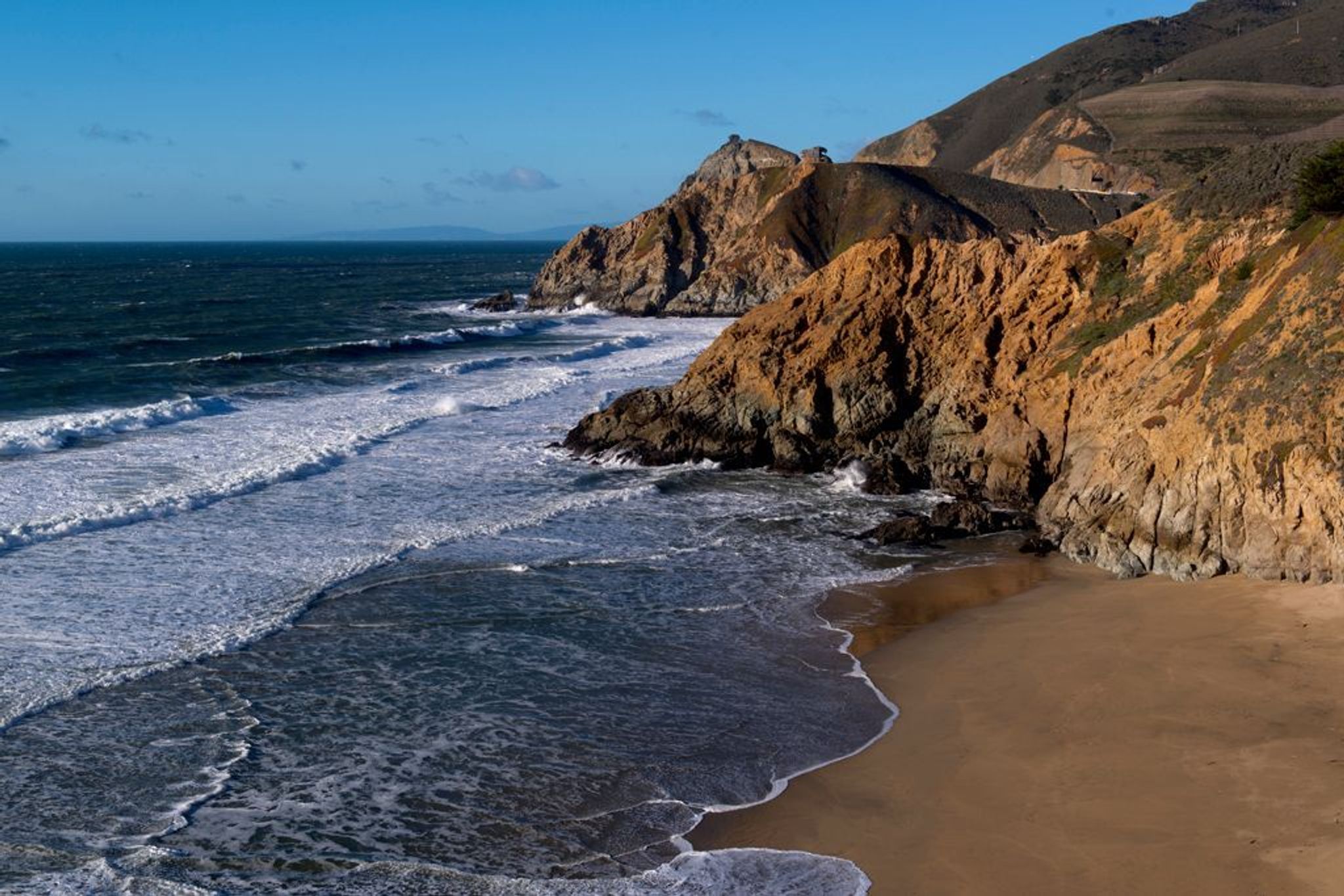 Beach cove and rock cliffs. 