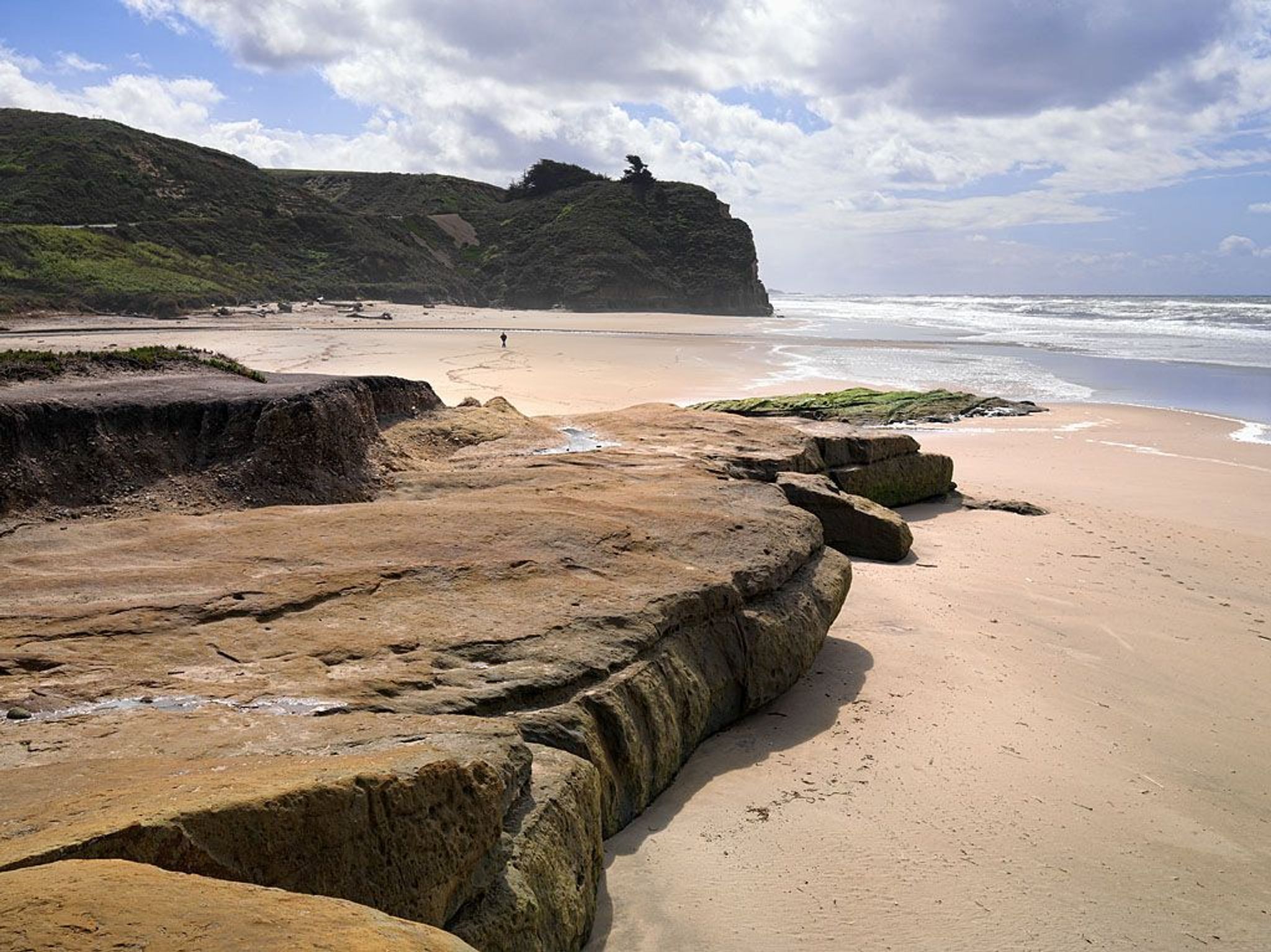 Rock outcrops on the beach at Pomponio.