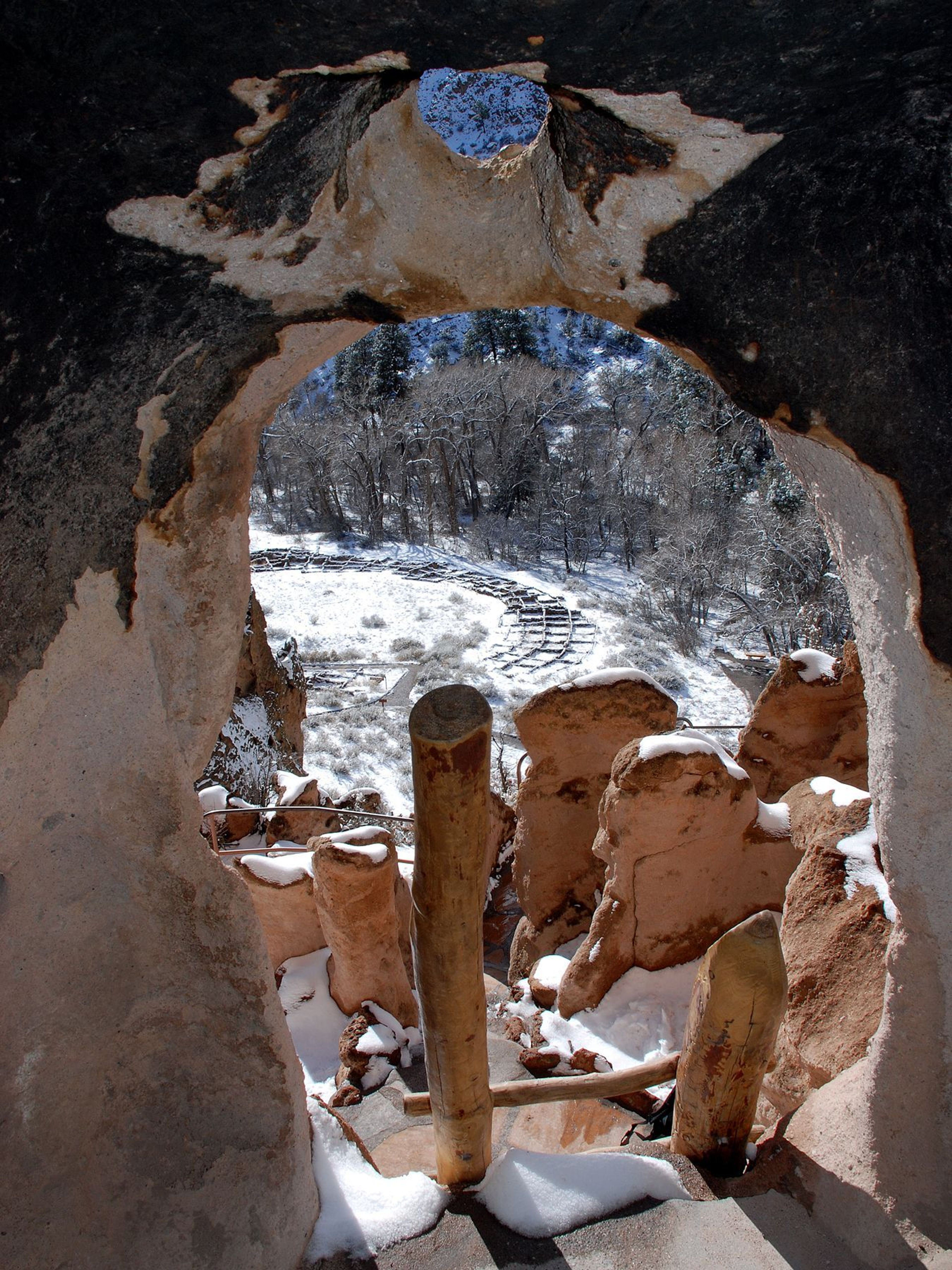 A view of Tyuonyi from a cavate along the Main Loop Trail in Frijoles Canyon.