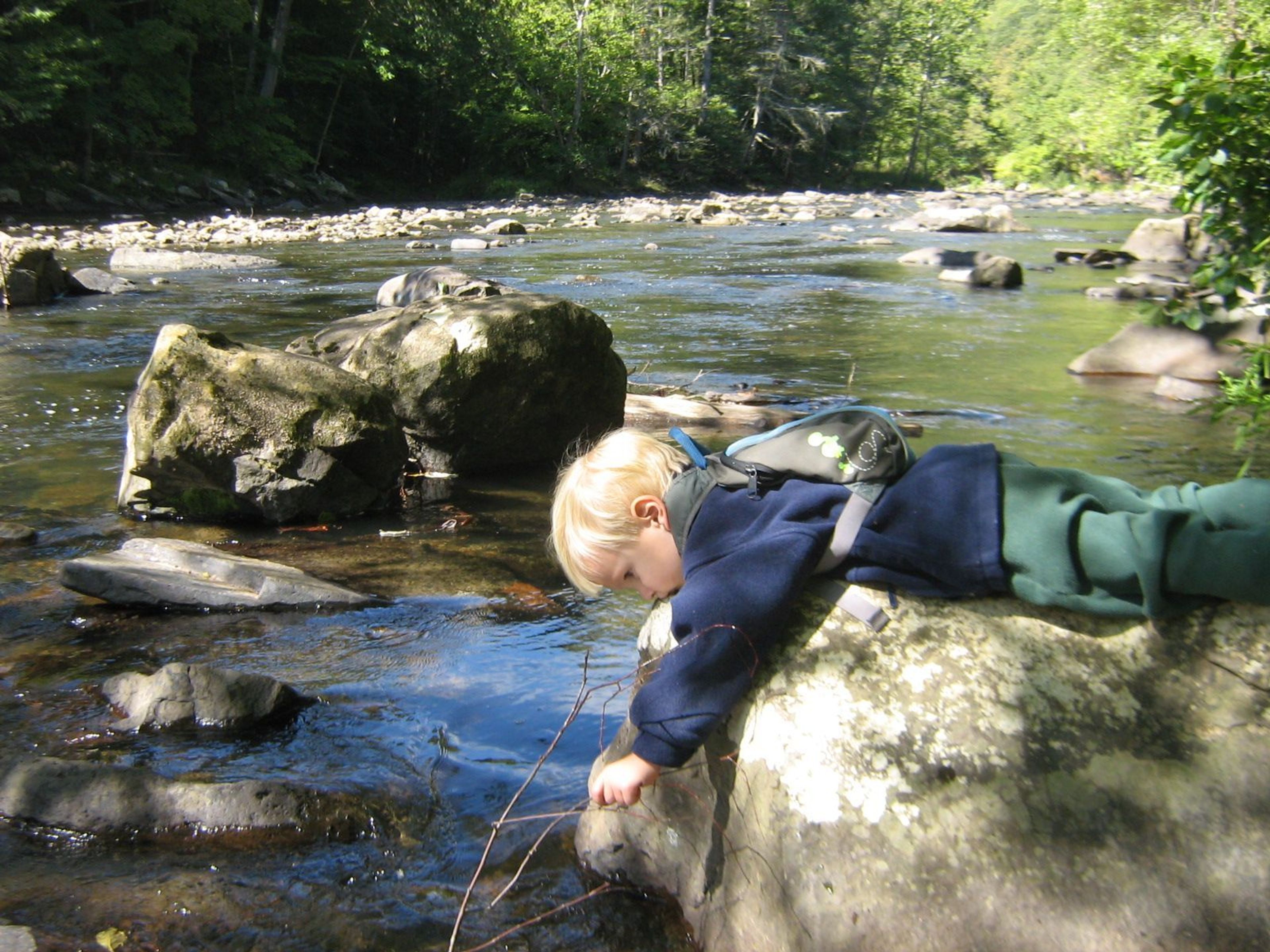 A young hiker makes his own connection with Bluestone National Scenic River.