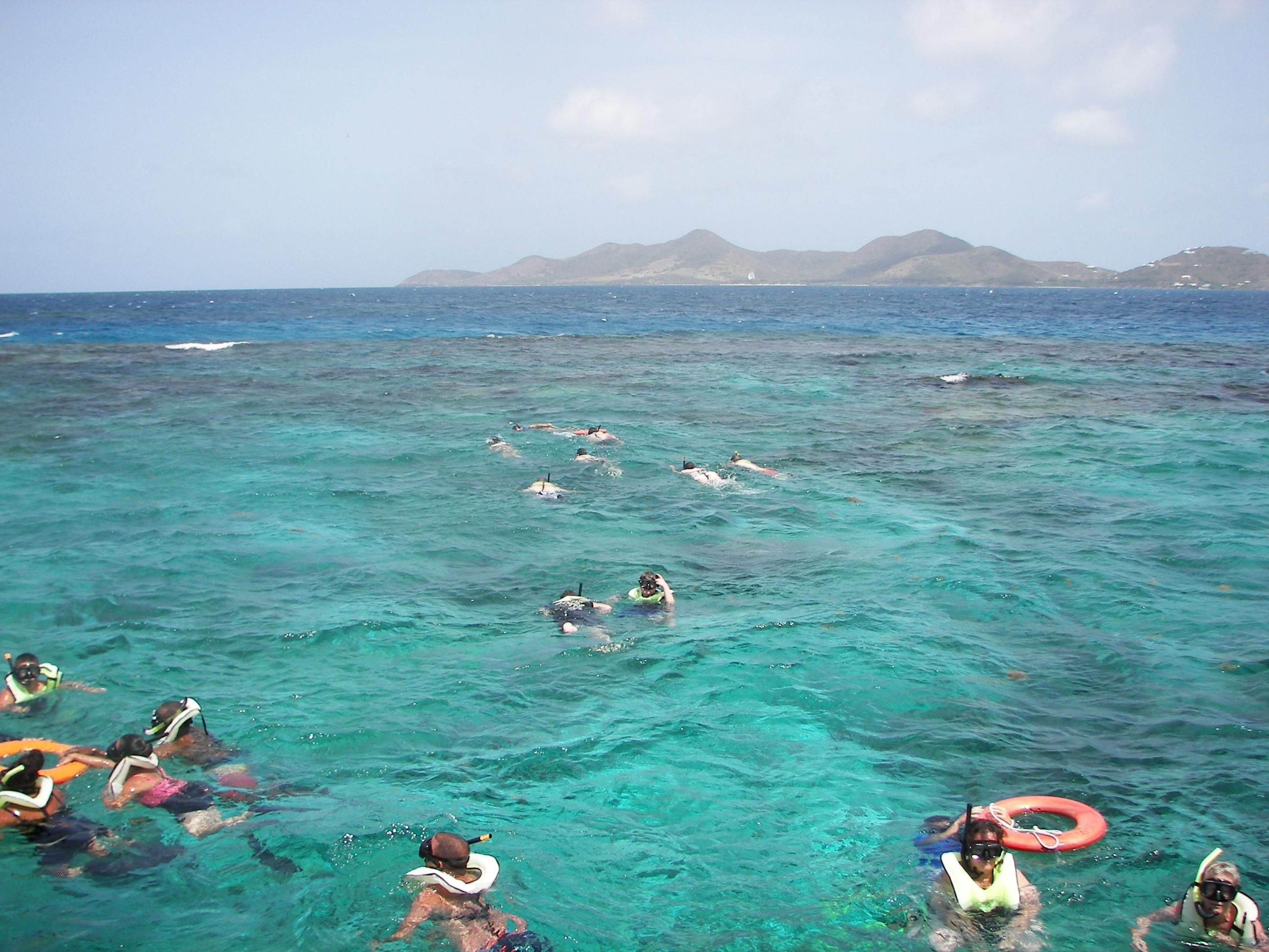 Snorkelers are lead in small groups through the underwater trail at Buck Island Reef NM.