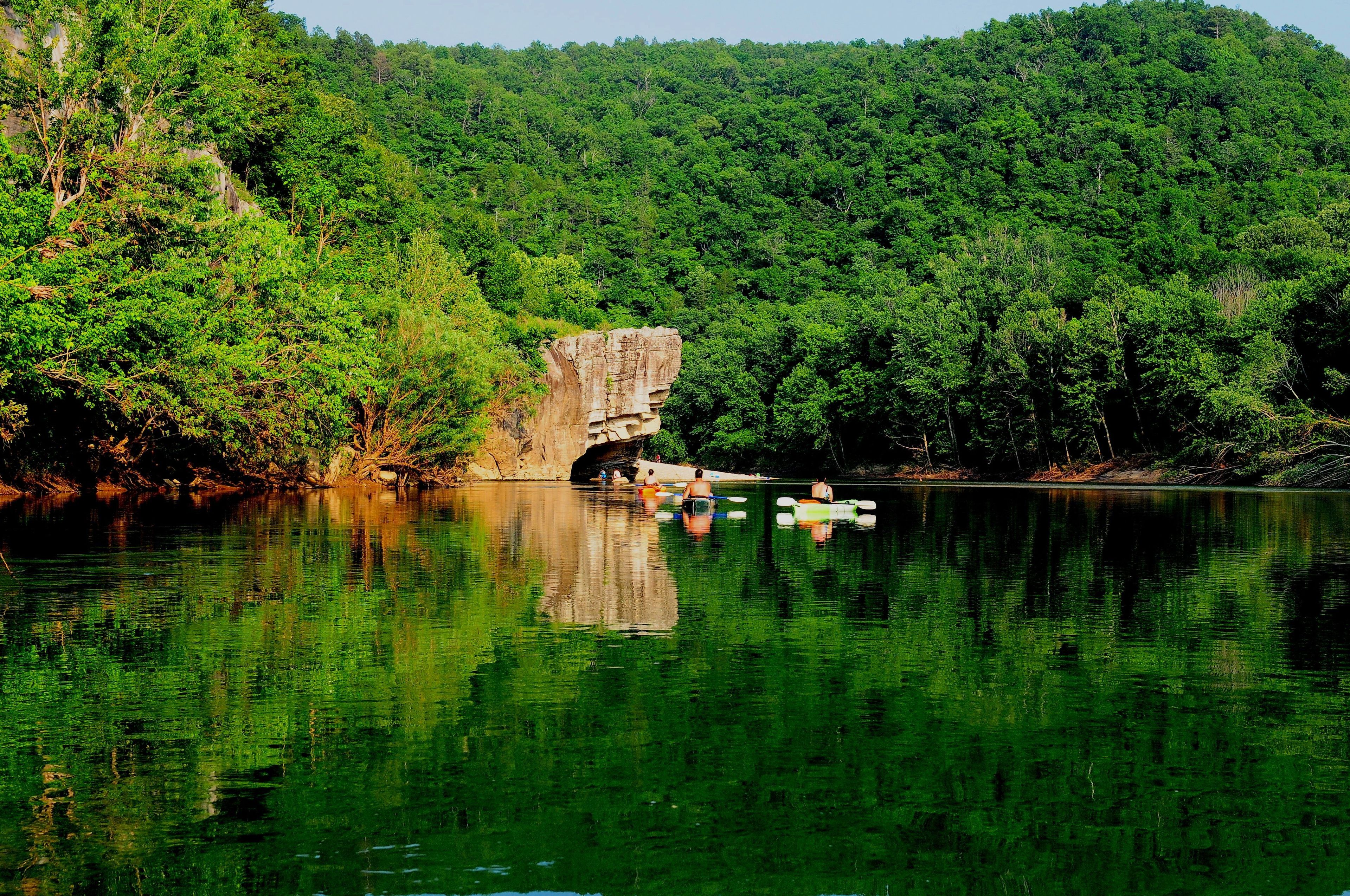 A peaceful day on the Buffalo River as kayakers approach Skull Rock and Buffalo Point.