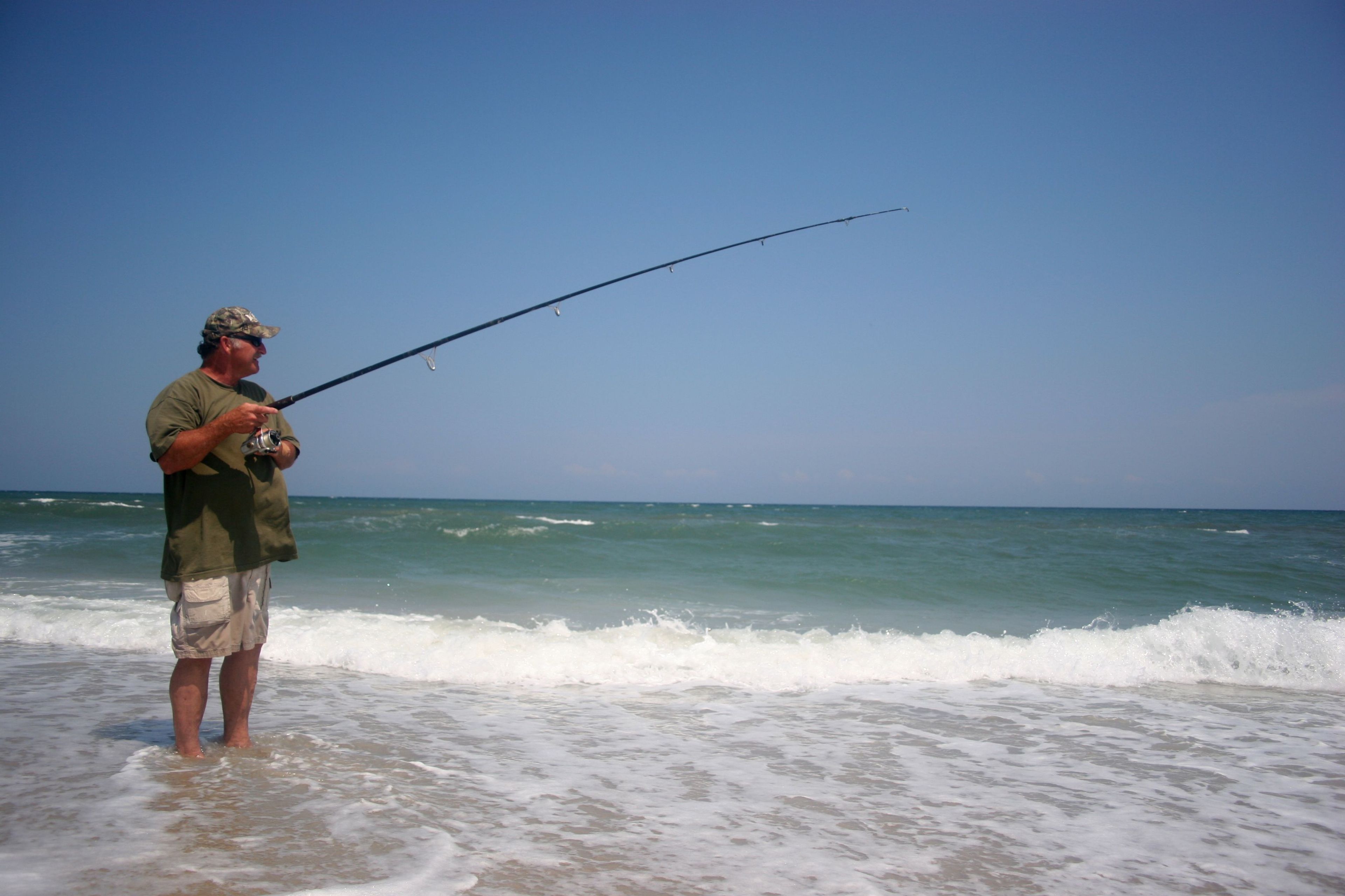 Surf fishing is a popular pastime at the beach