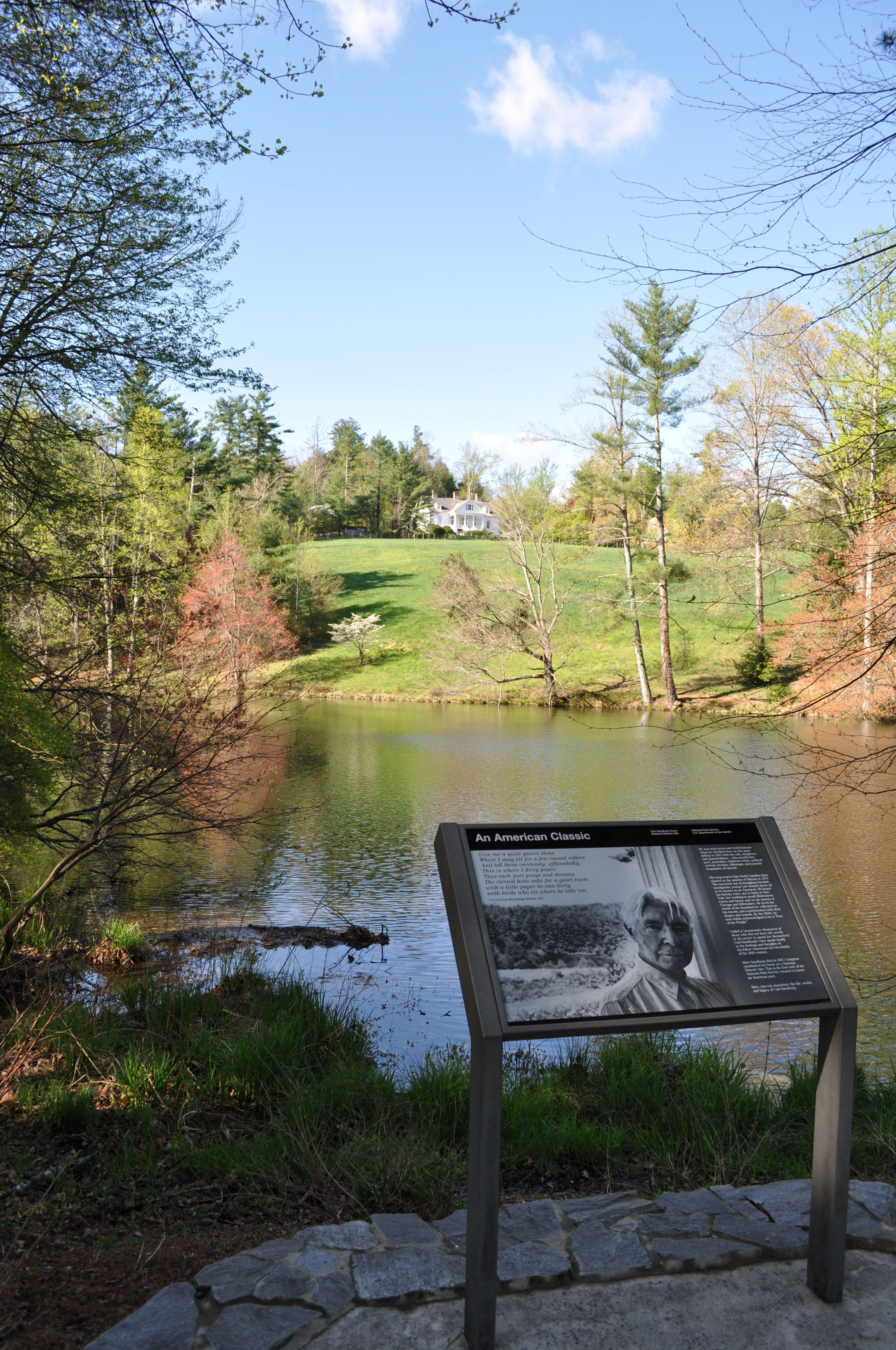 A view of the front lake and Sandburg Home as visitors enter the park