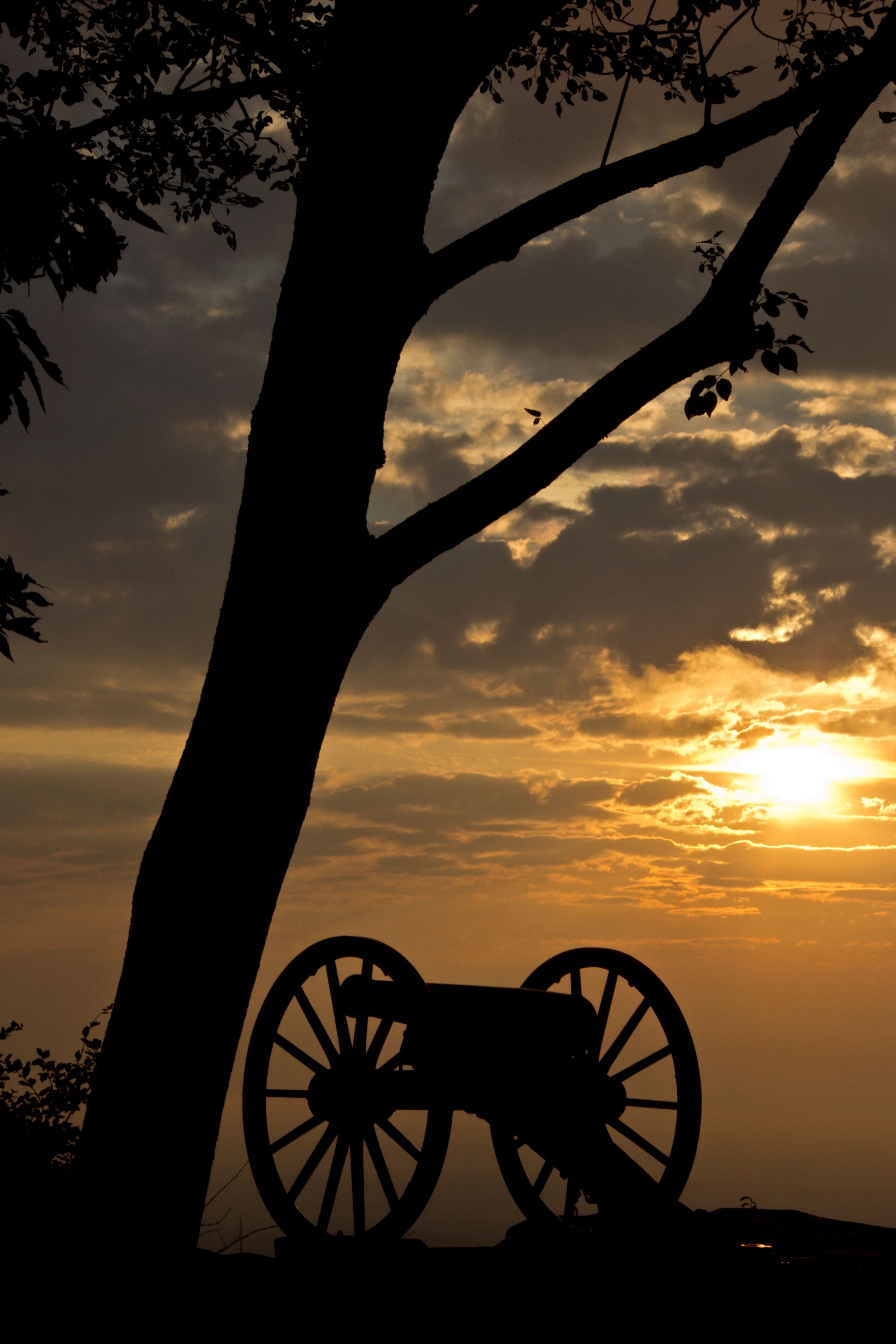 As the sun sets on Lookout Mountain, a lone cannon guards the valley below.