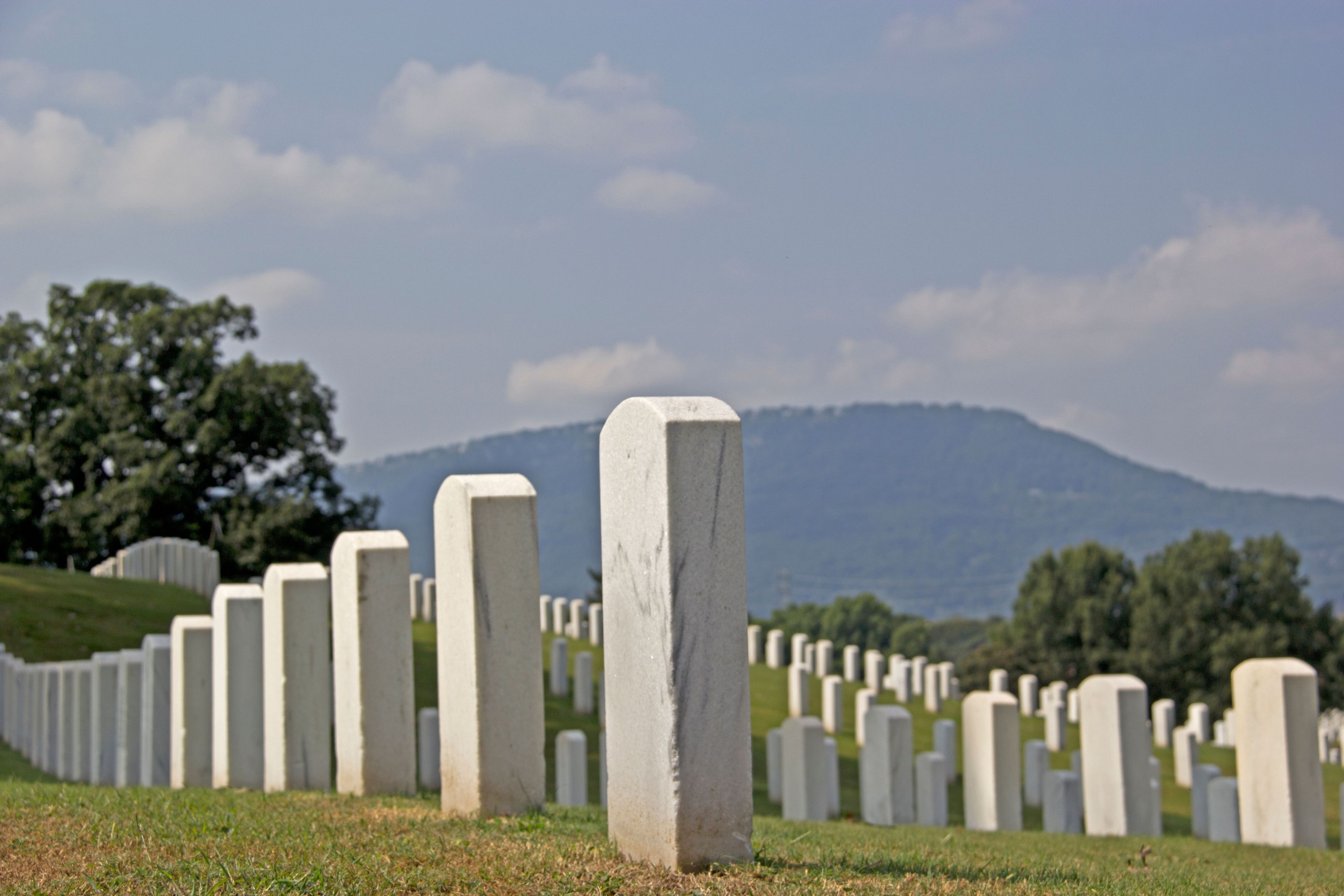 The graves of fallen soldiers from Chickamauga to present dot the landscape in Chattanooga as Lookout Mountain looms in the background