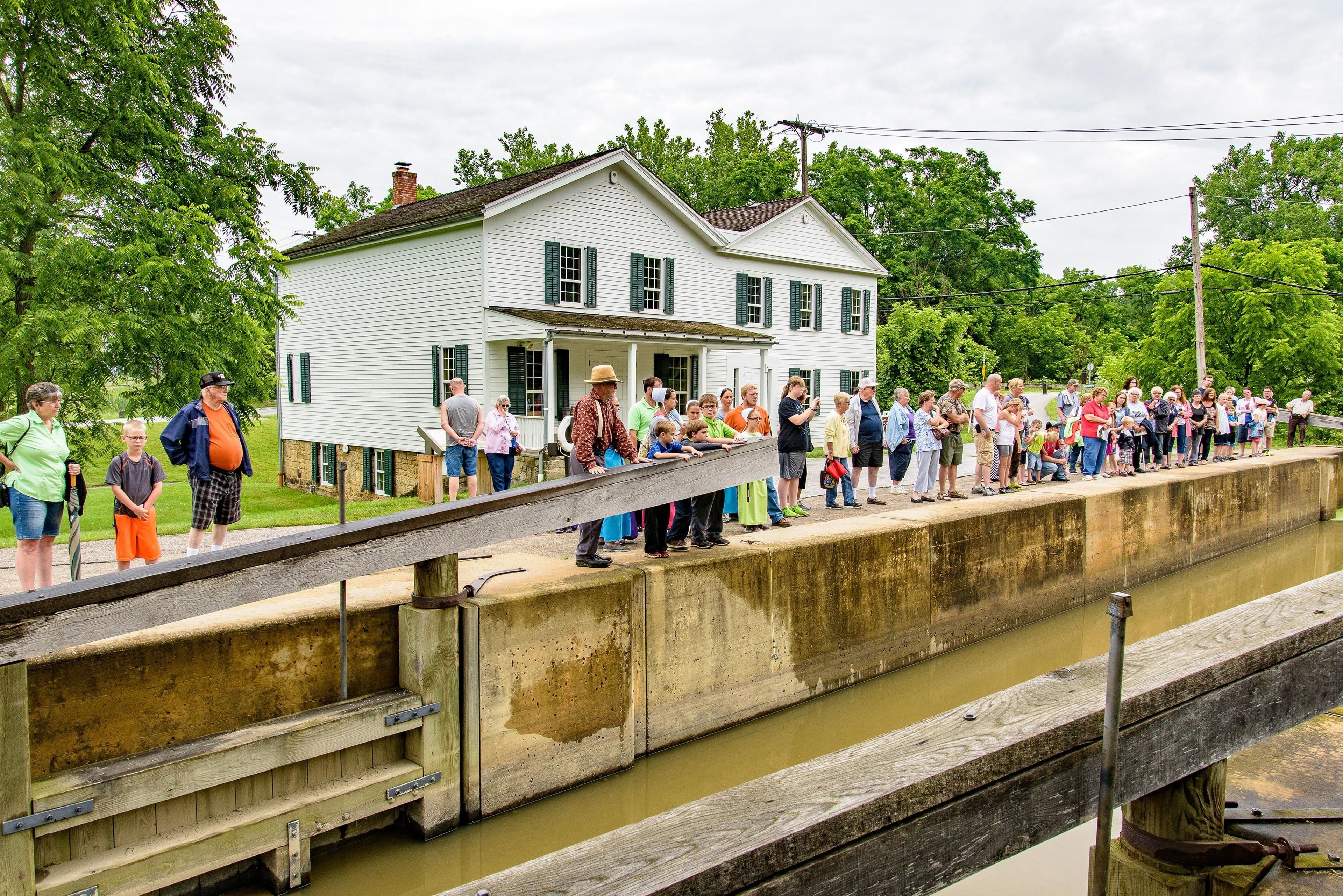 Visitors watch a lock demonstration at Canal Exploration Center.