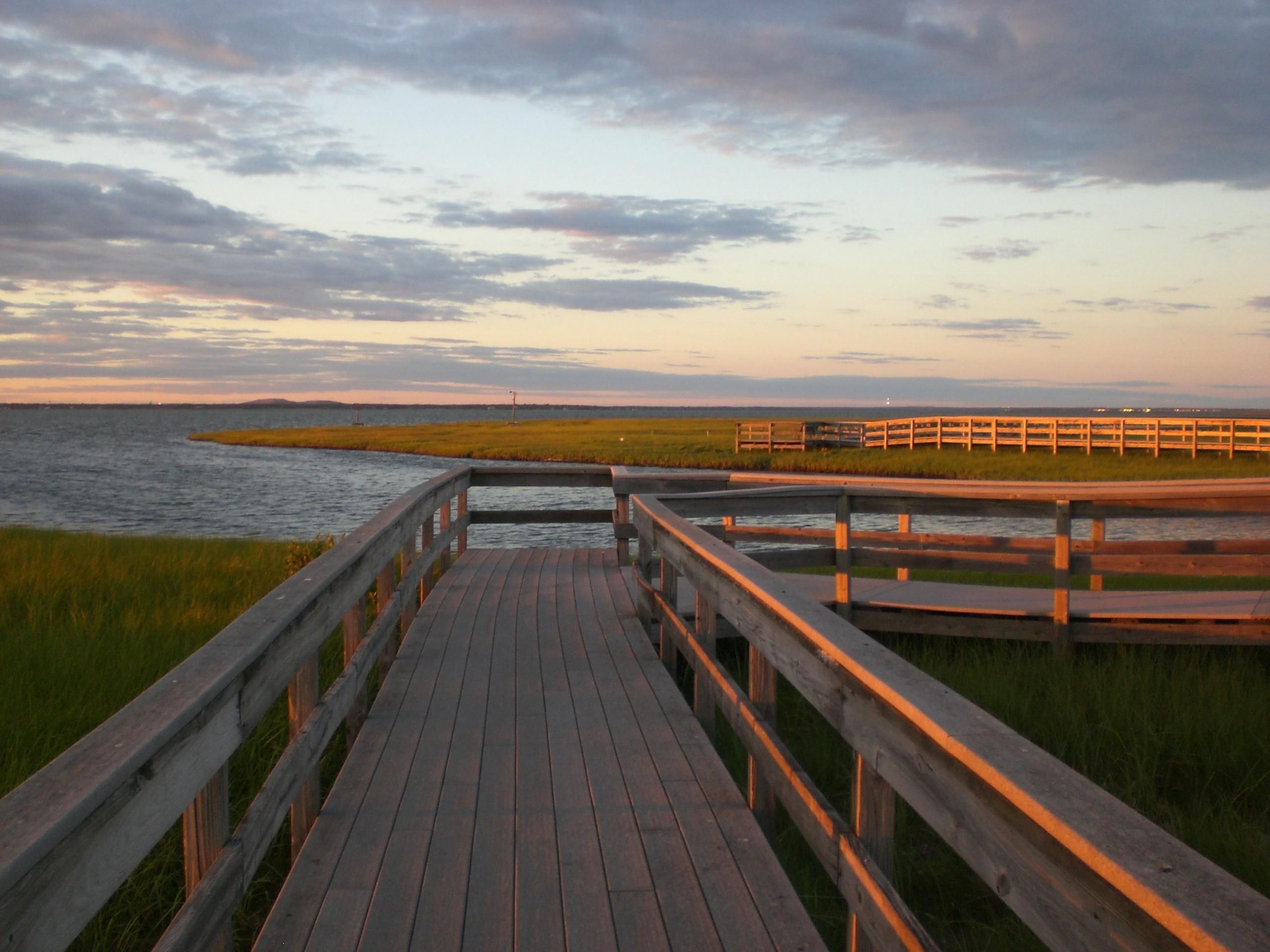 A boardwalk trail welcomes visitors to a salt marsh at Watch Hill.