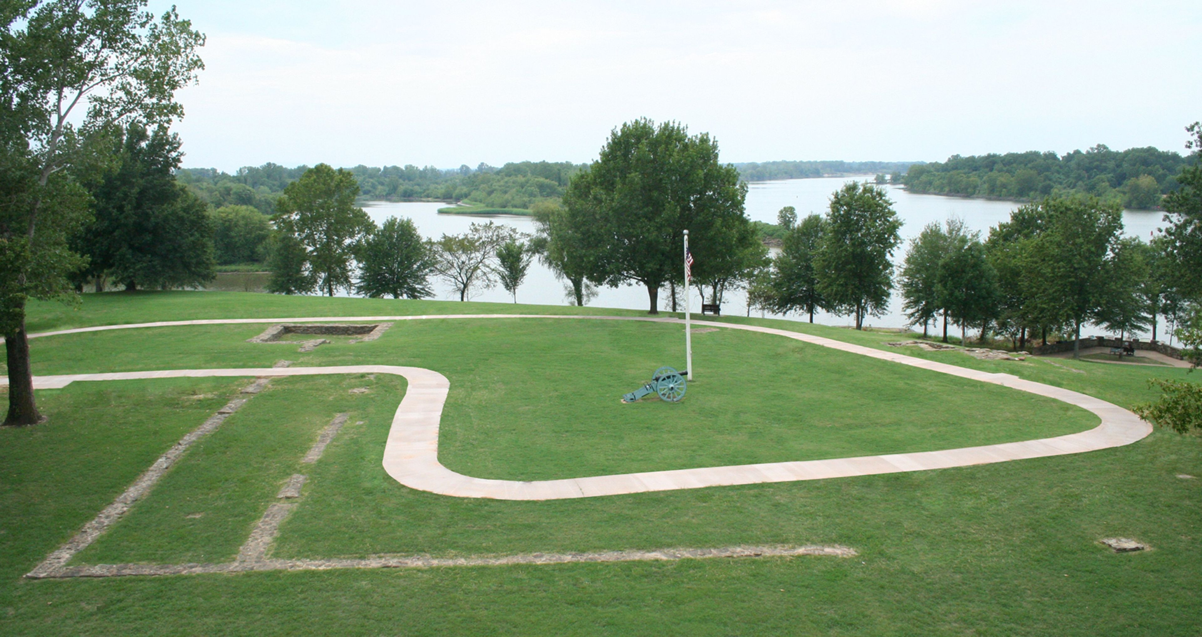 Foundations of the first Fort Smith with Arkansas River in the background