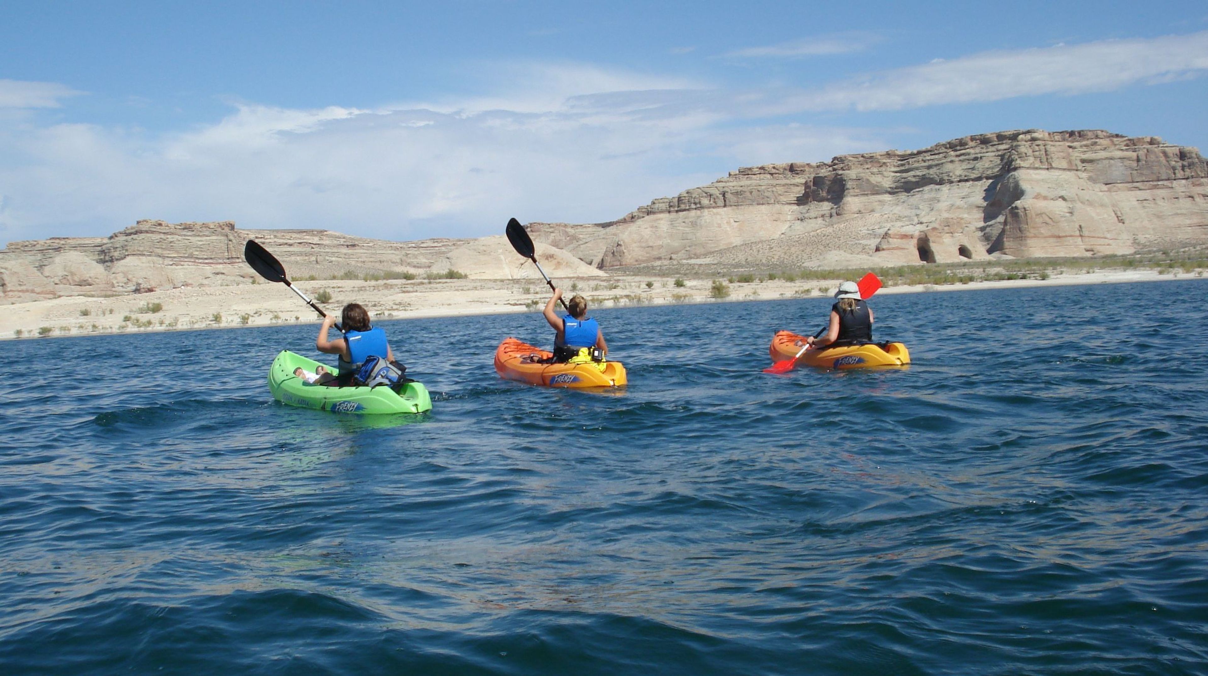 If motorized recreation isn't your thing, take a kayak and paddle through the high side canyons of Lake Powell.