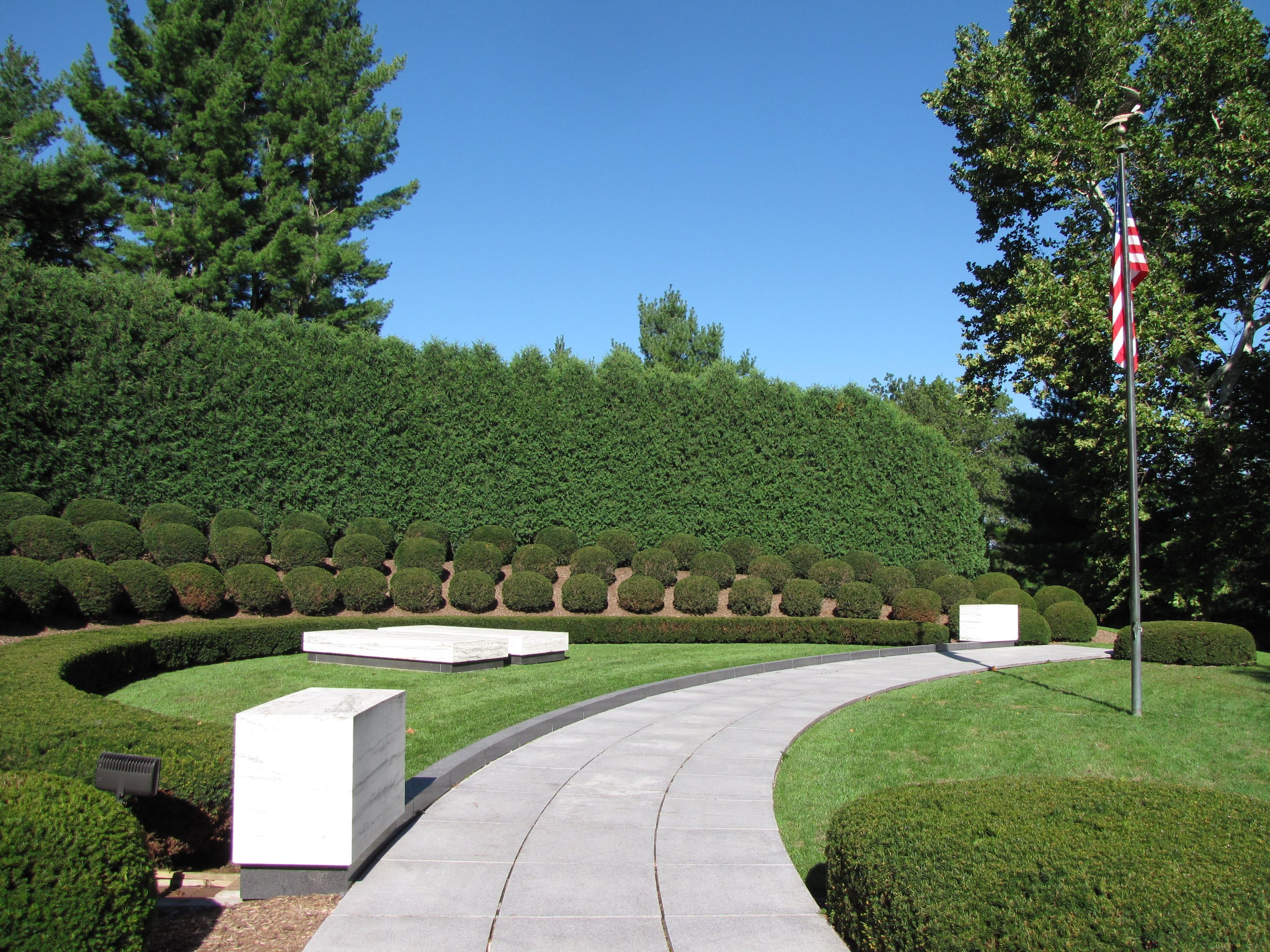 Two simple marble slabs mark the graves of Herbert and Lou Henry Hoover.