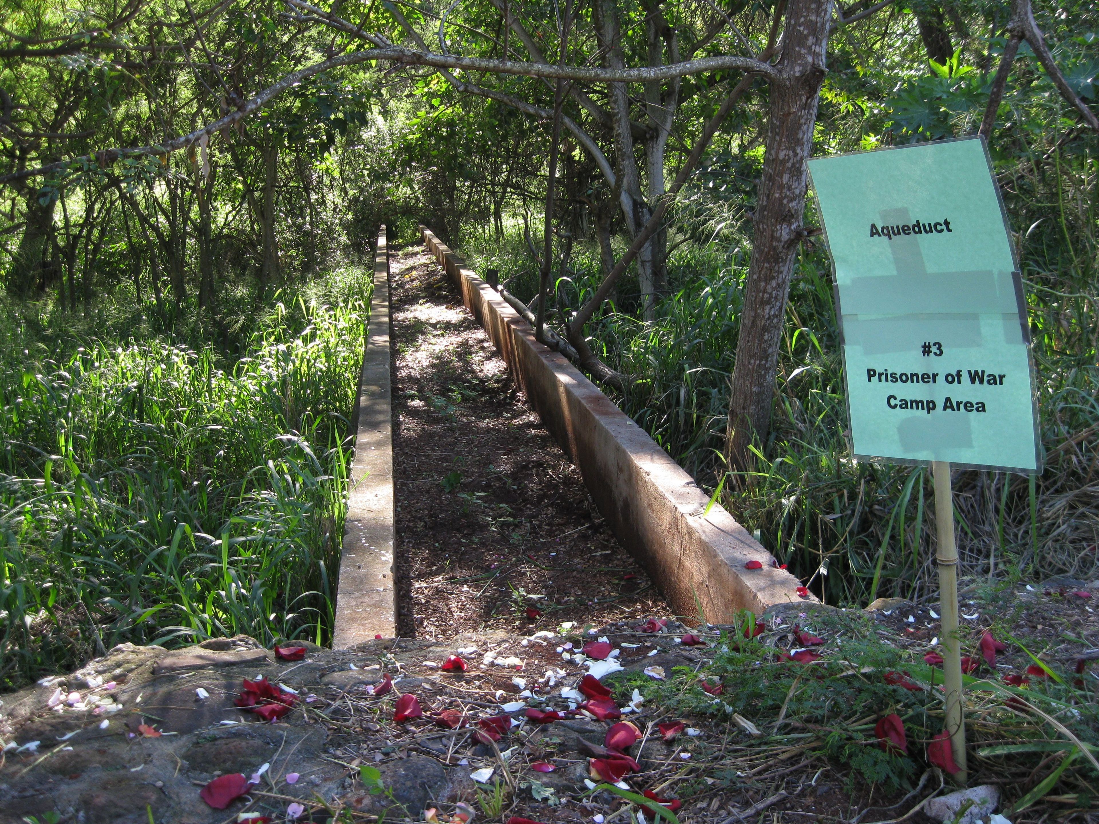 An aqueduct separated prisoners of war from internees at Honouliuli Internment Camp. The aqueduct provided water for both internment and prisoners of war camps.