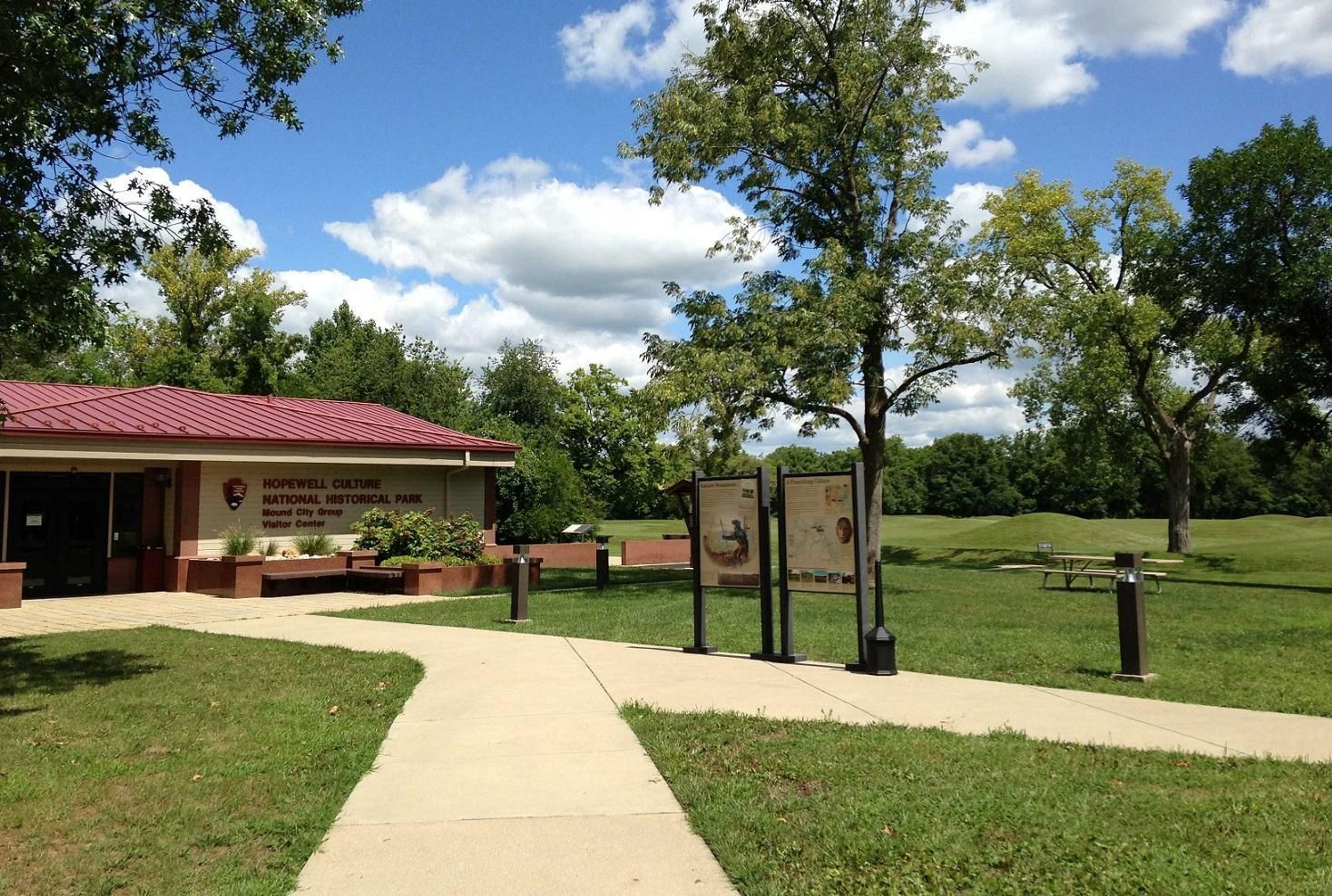 The Mound City Group visitor center main entrance with Mound City Group in the background view