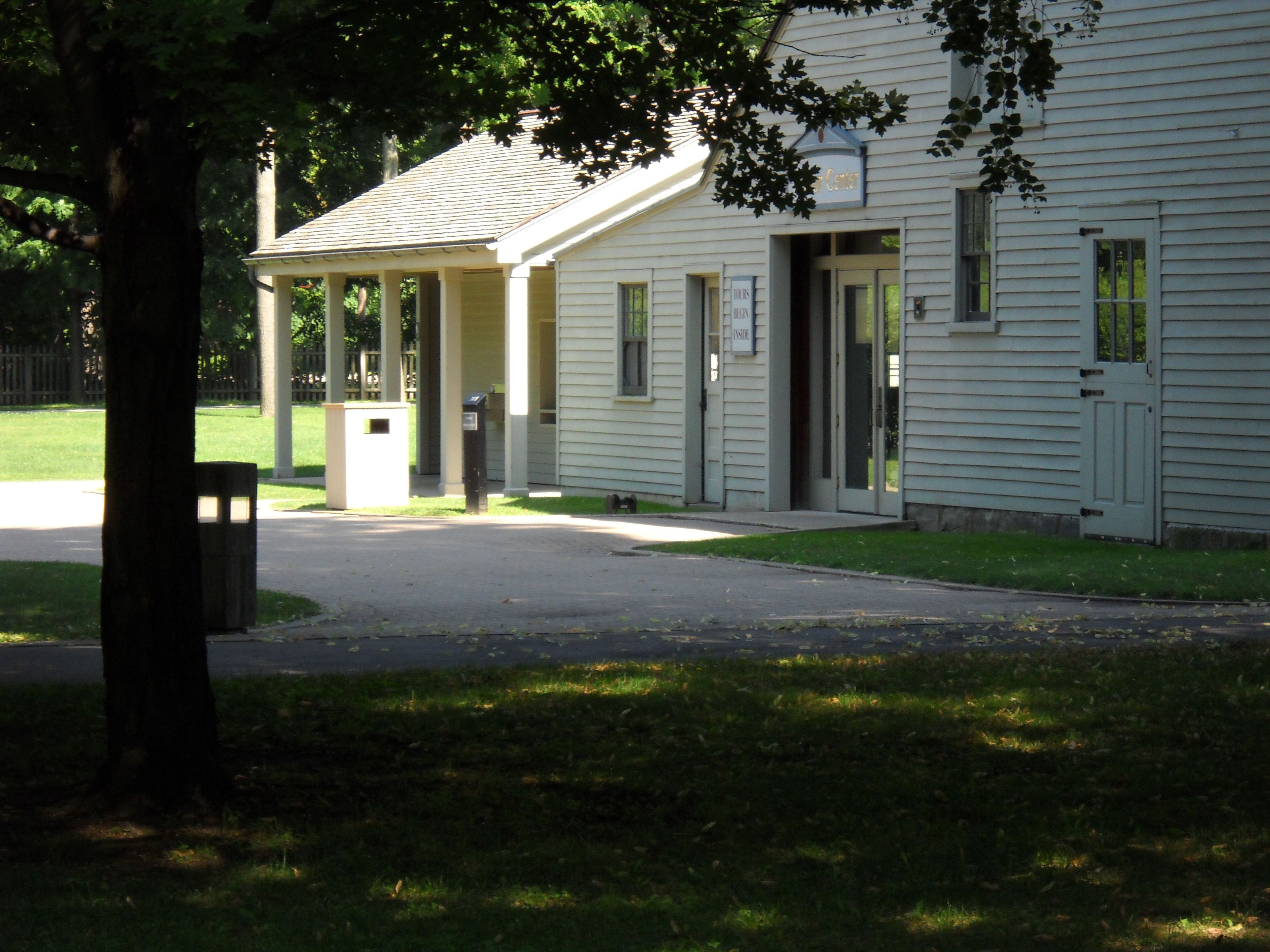 A friendly greeting awaits visitors who enter the Visitor Center. This historic building, constructed in 1894, serves as bookstore, exhibit gallery and auditorium where the park film is shown. Tickets for tours of the Garfield home are also available her