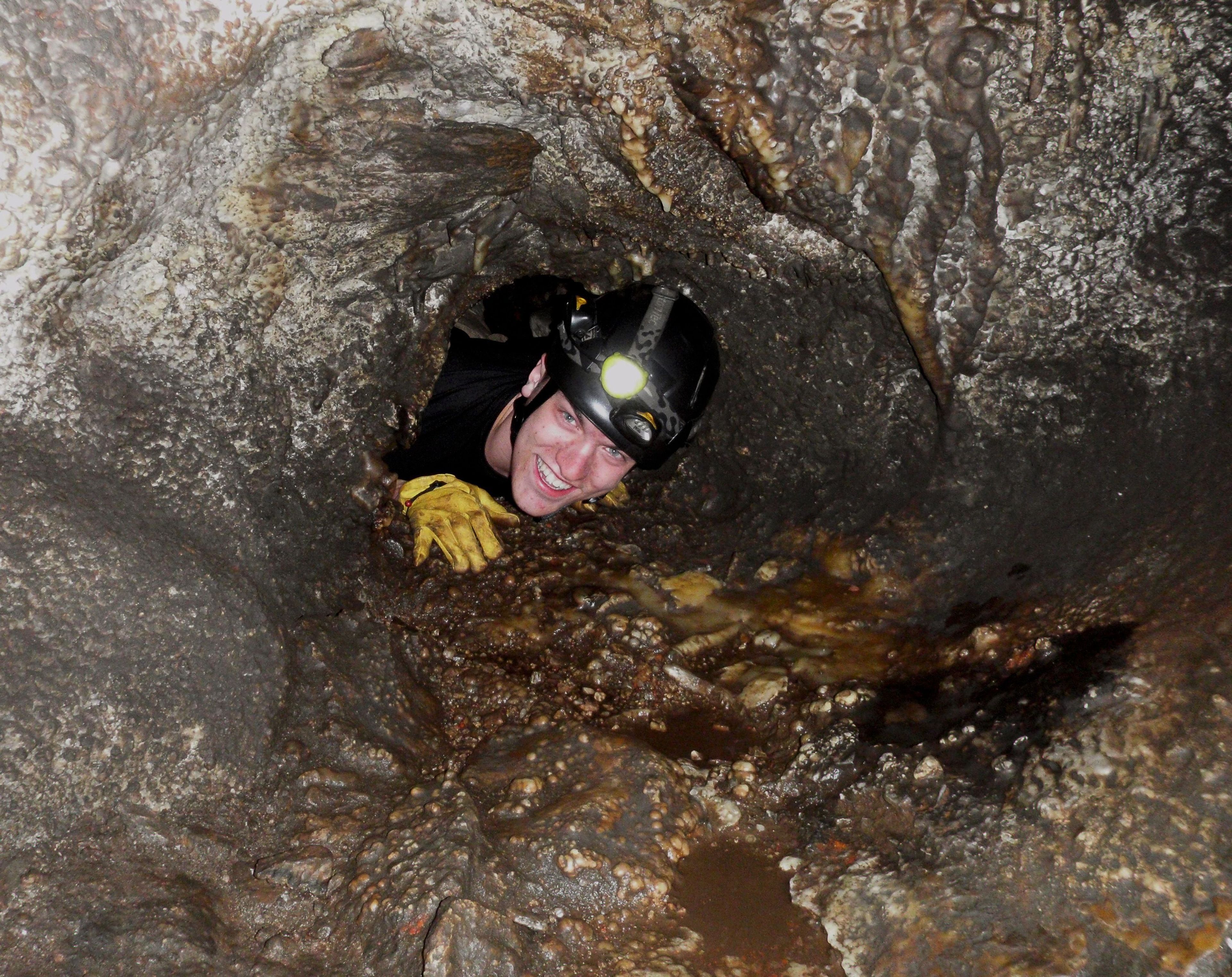 The Brain Drain is approximately eight inches high by 24 inches wide and is the tightest passage on the Wild Caving Tour.