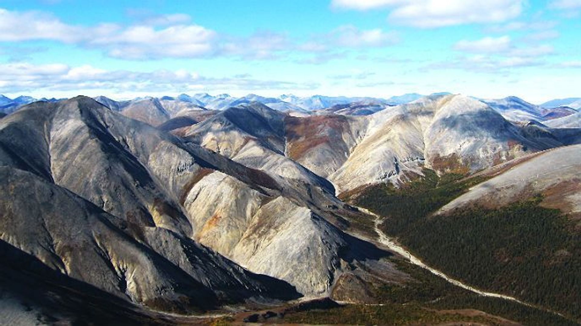 The peaks of the Baird Mountains stretch far into the distance and are so remote that many of them have not been named.