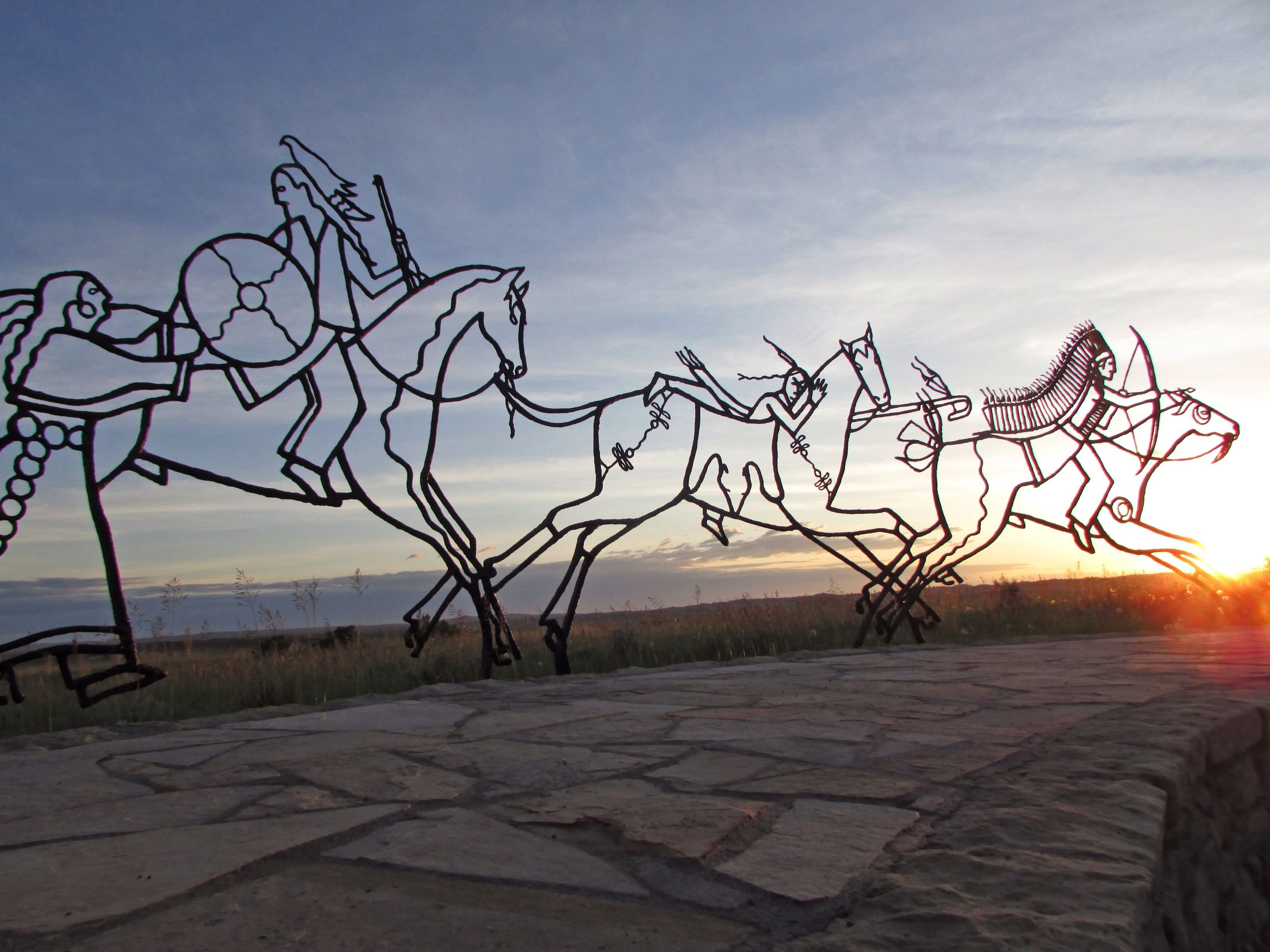 The Indian Memorial is a circular earthwork carved gently into the prairie. The walls carry the names of those who fell here as well as the words of some who fought in the battle.