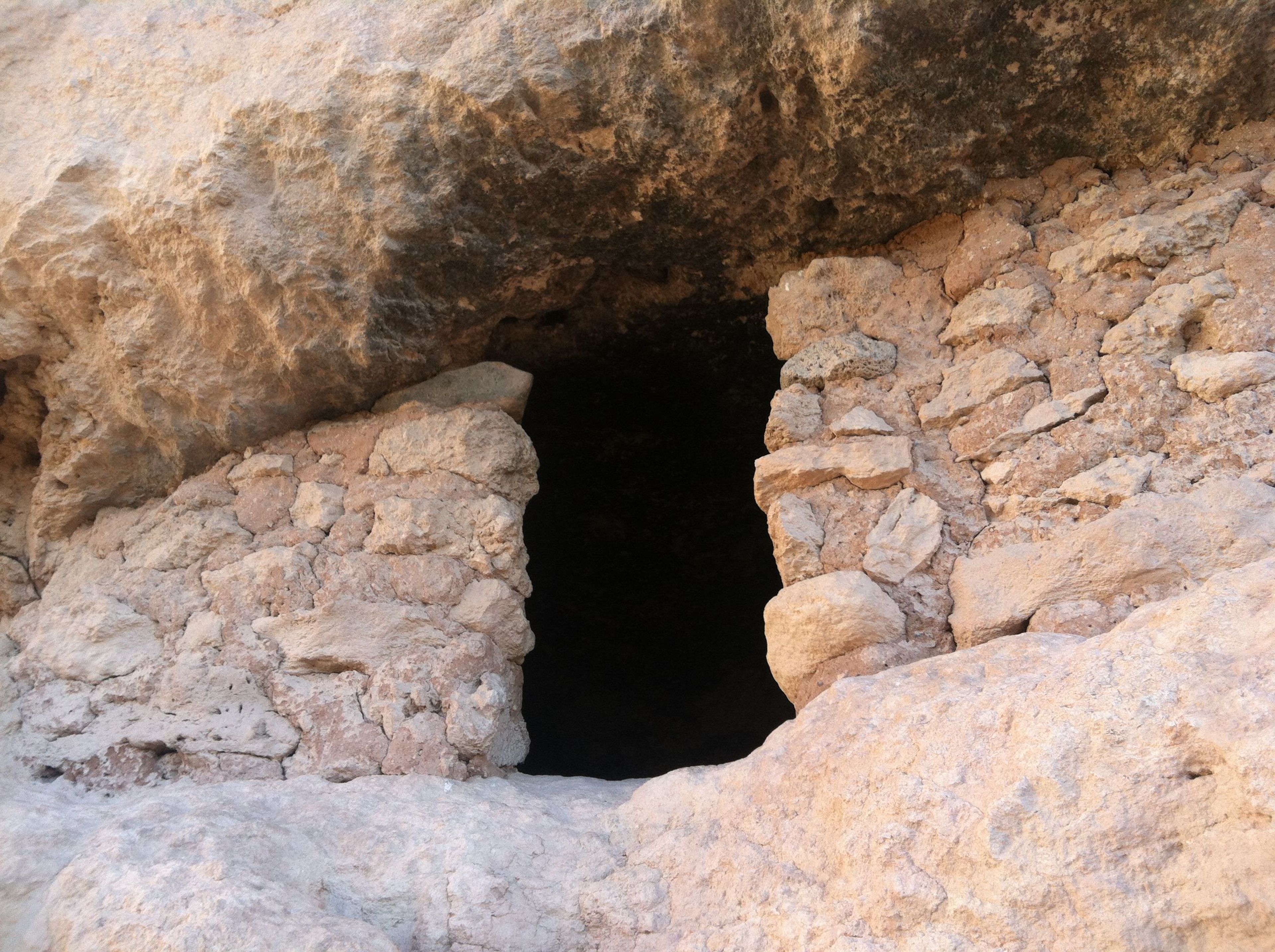 The Sinagua used space efficiently - here a storage room sits in a short cliff space below the main Castle.