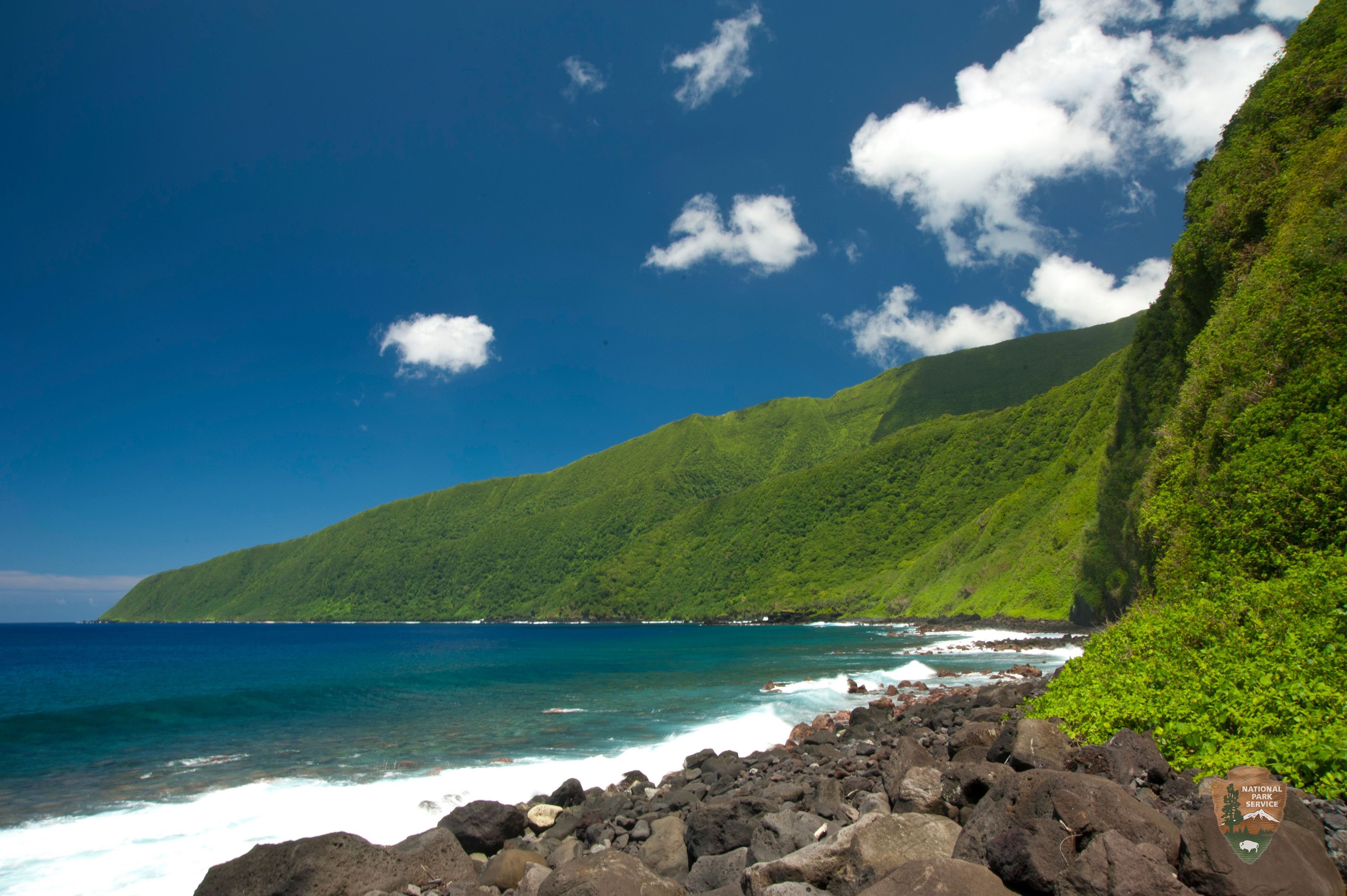 Si'u Point is a good place to view the south coast of Ta'u. some of the tallest sea cliffs in the world stairstep over 3,000 feet to the summit of Lata Mountain.