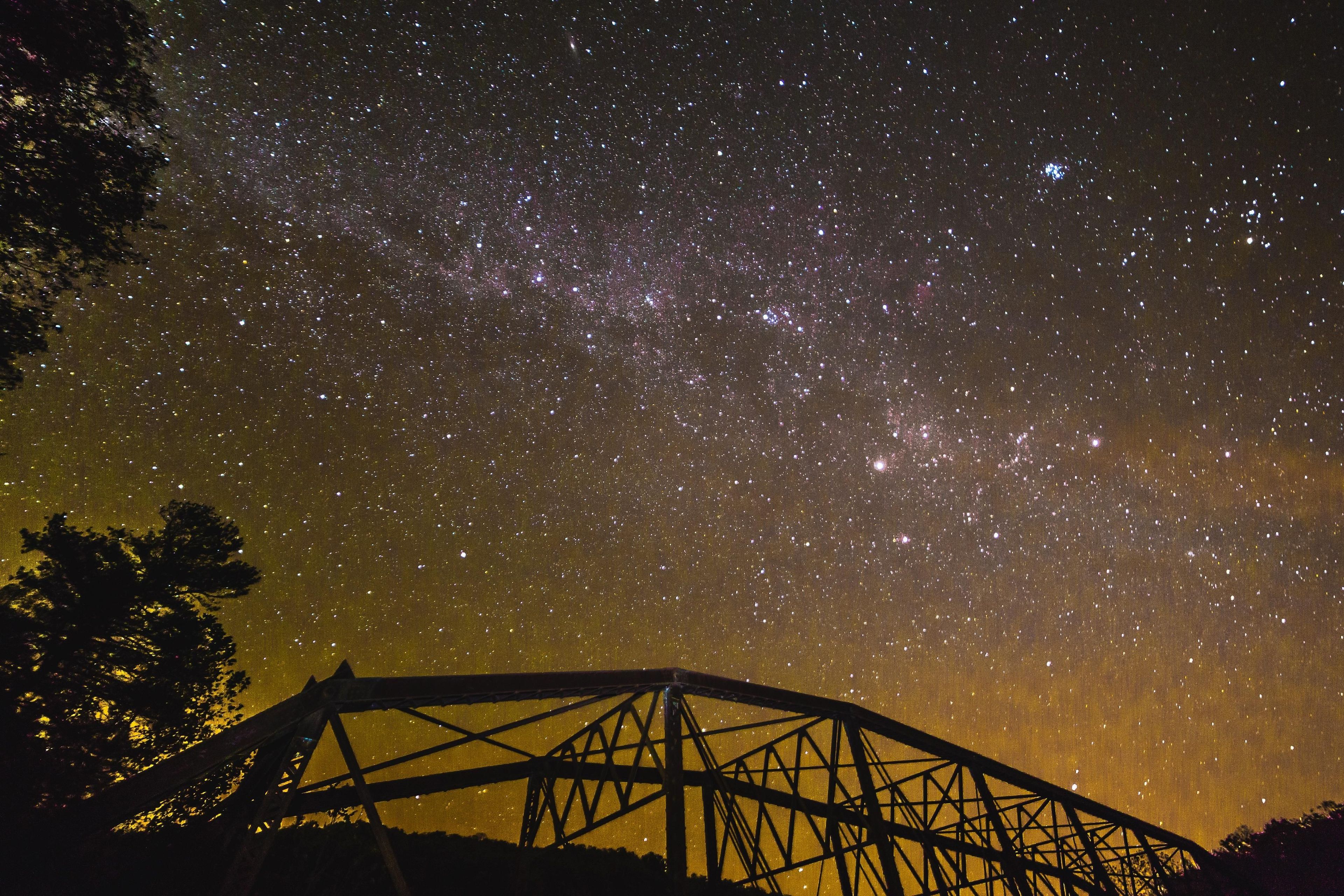 A Star-Filled Night Sky above the Historic Nemo Bridge