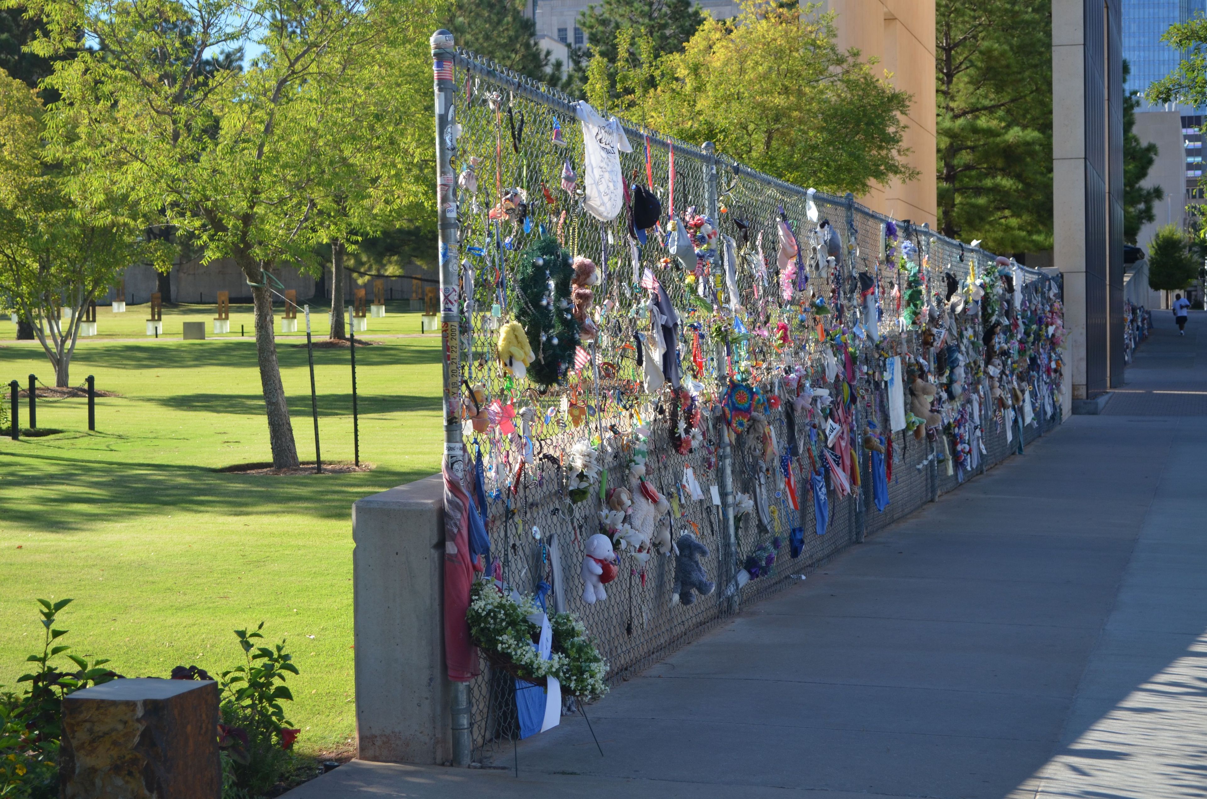 This 200 foot section of chain link fence was taken from the original barrier surrounding the bombing site. The fence served as the first spontaneous memorial and a location for people to leave tokens of collective grief. It retains this purpose still to