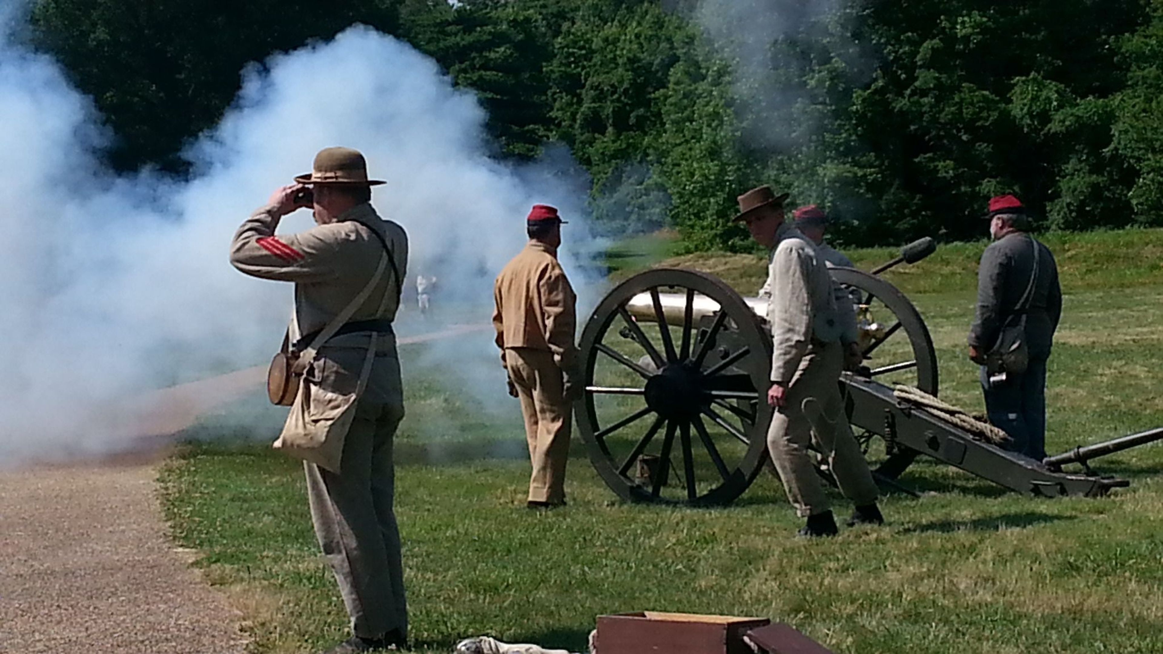 Thousands of visitors learn the steps involved in firing off a Civil War cannon by members of the Pegram's Battery Reenactment Unit.