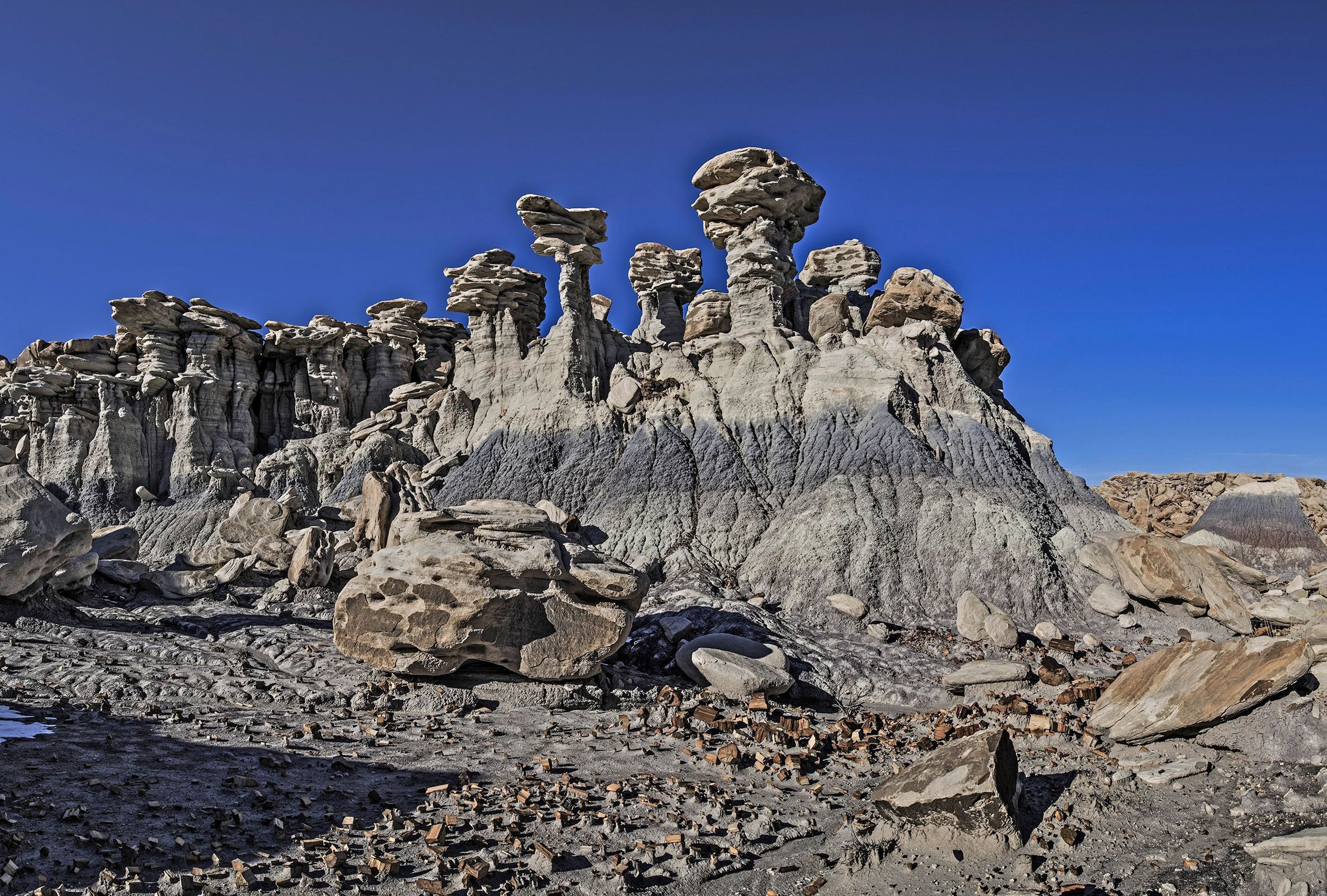 Eroded towers called hoodoos loom above Devil's Playground.