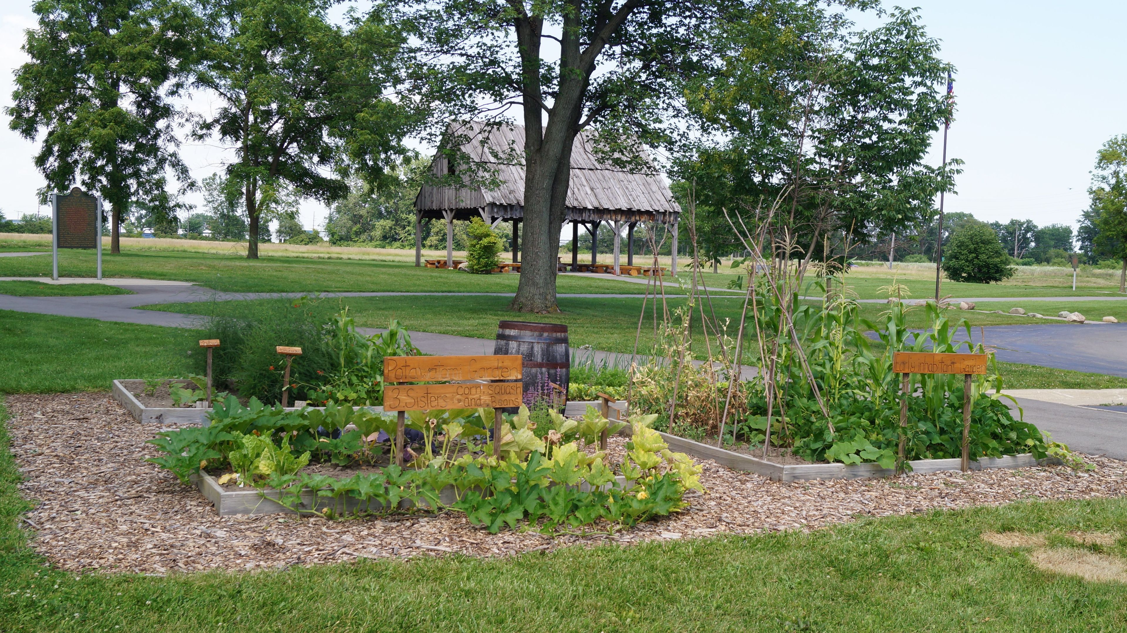 Visitors enjoy the period gardens and trails in the Park