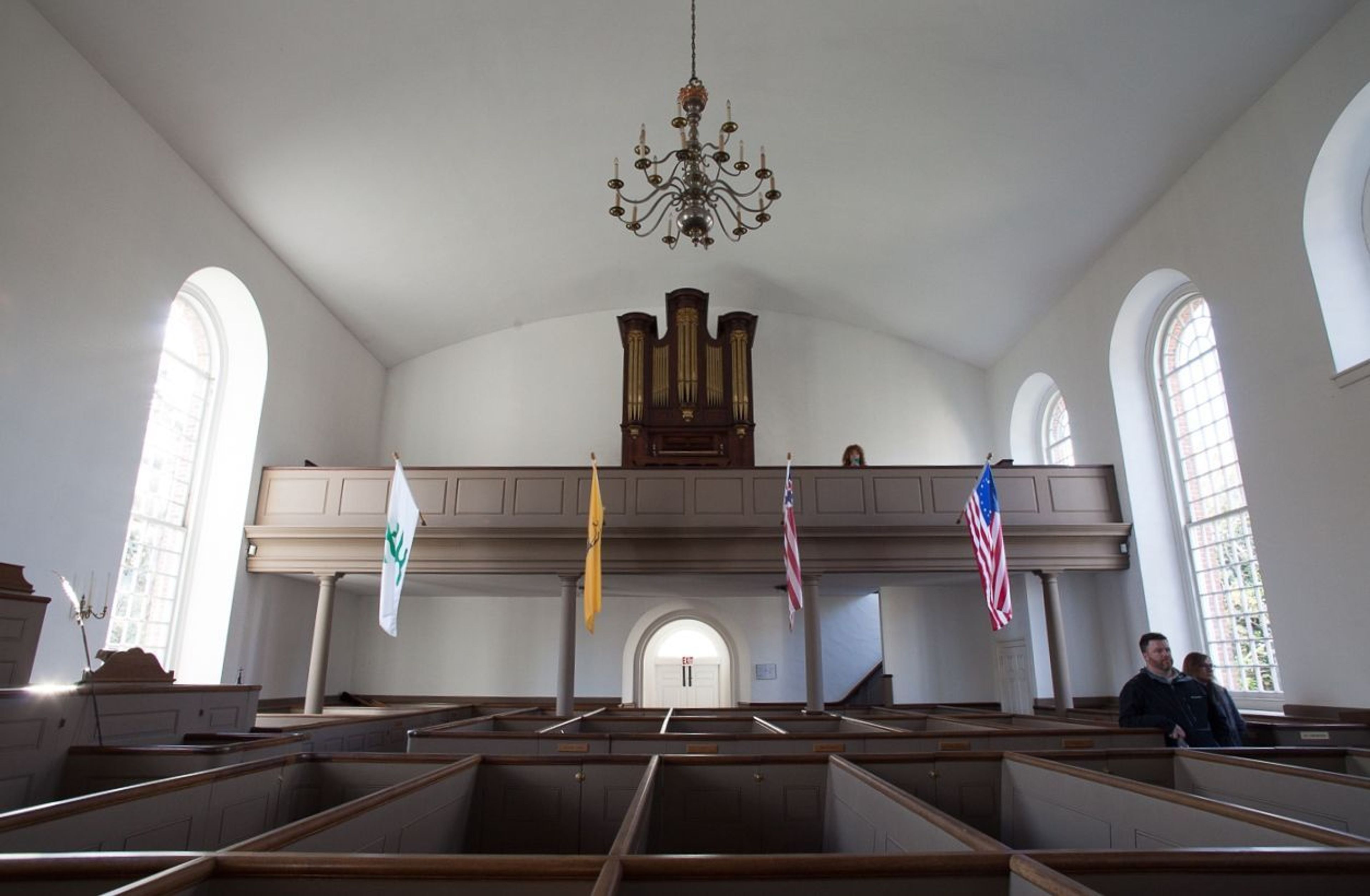 The pews have been rebuilt to resemble what was here when the stone church was first opened.