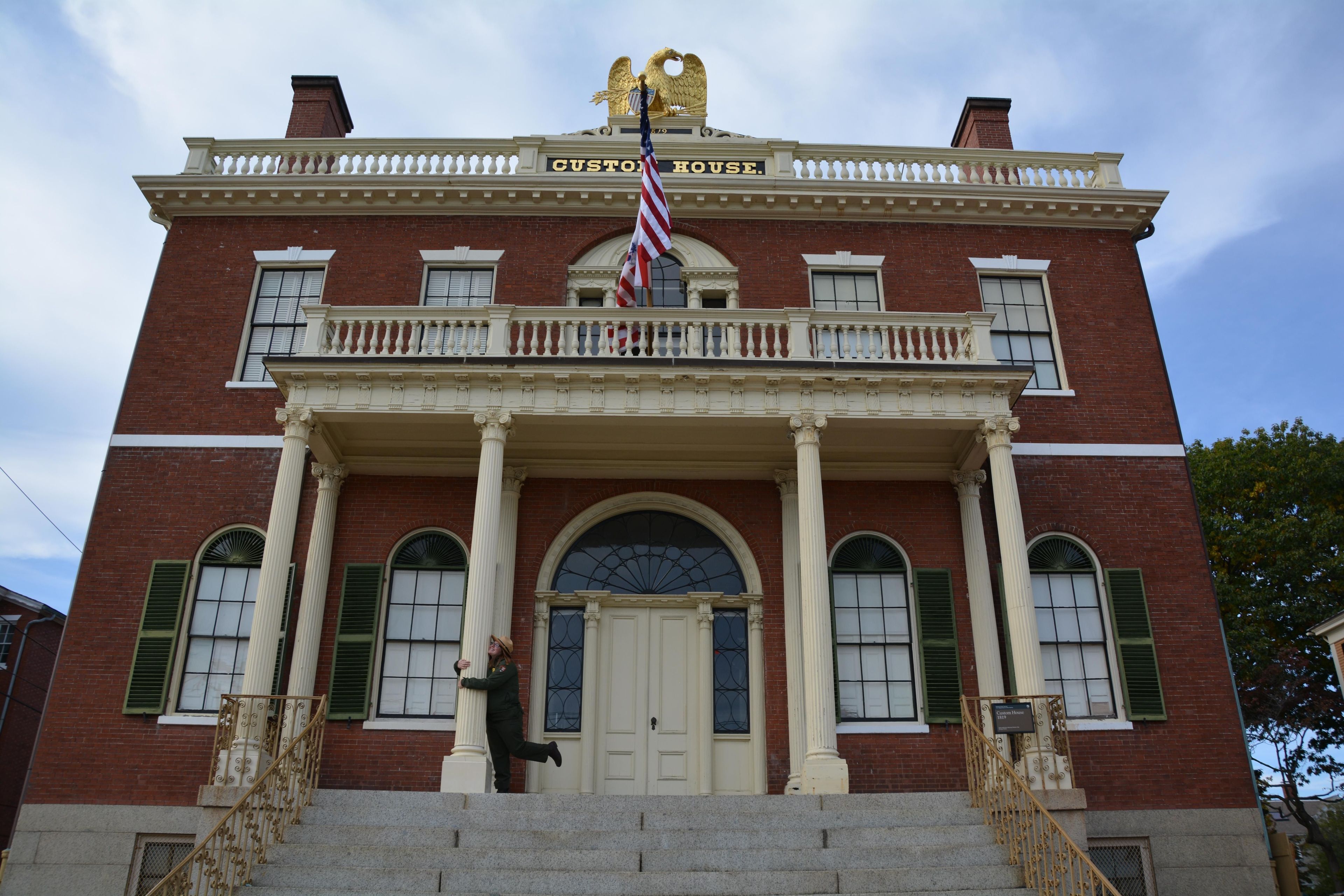 This Custom House was built in 1819 and housed offices for the officers of the U.S. Customs Service, as well as an attached warehouse, the Public Stores, used for the storage of bonded and impounded cargo.