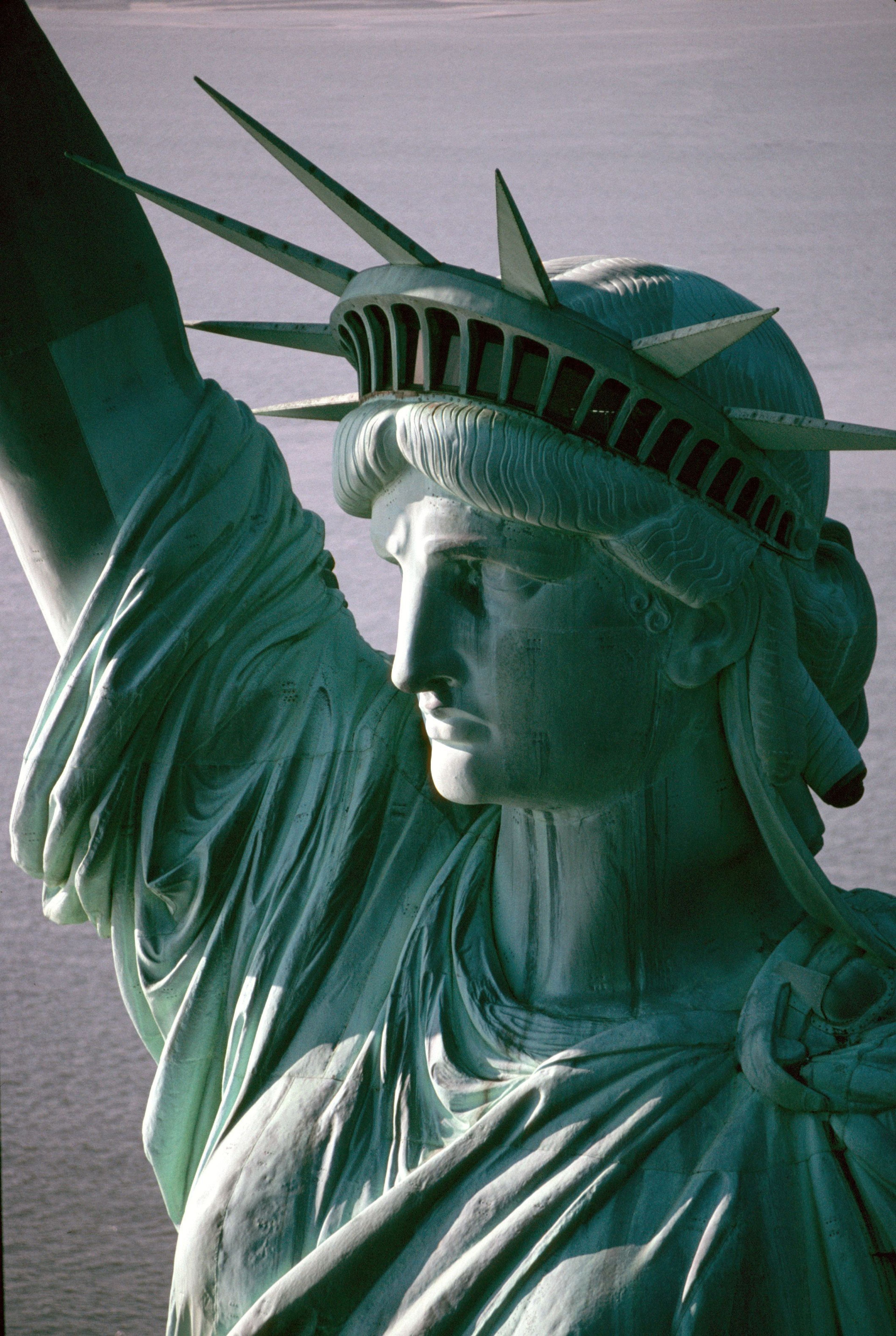 This close-up reveals fine details of the Statue of Liberty's face, hair, crown, and robe, which can be difficult to see even in person.