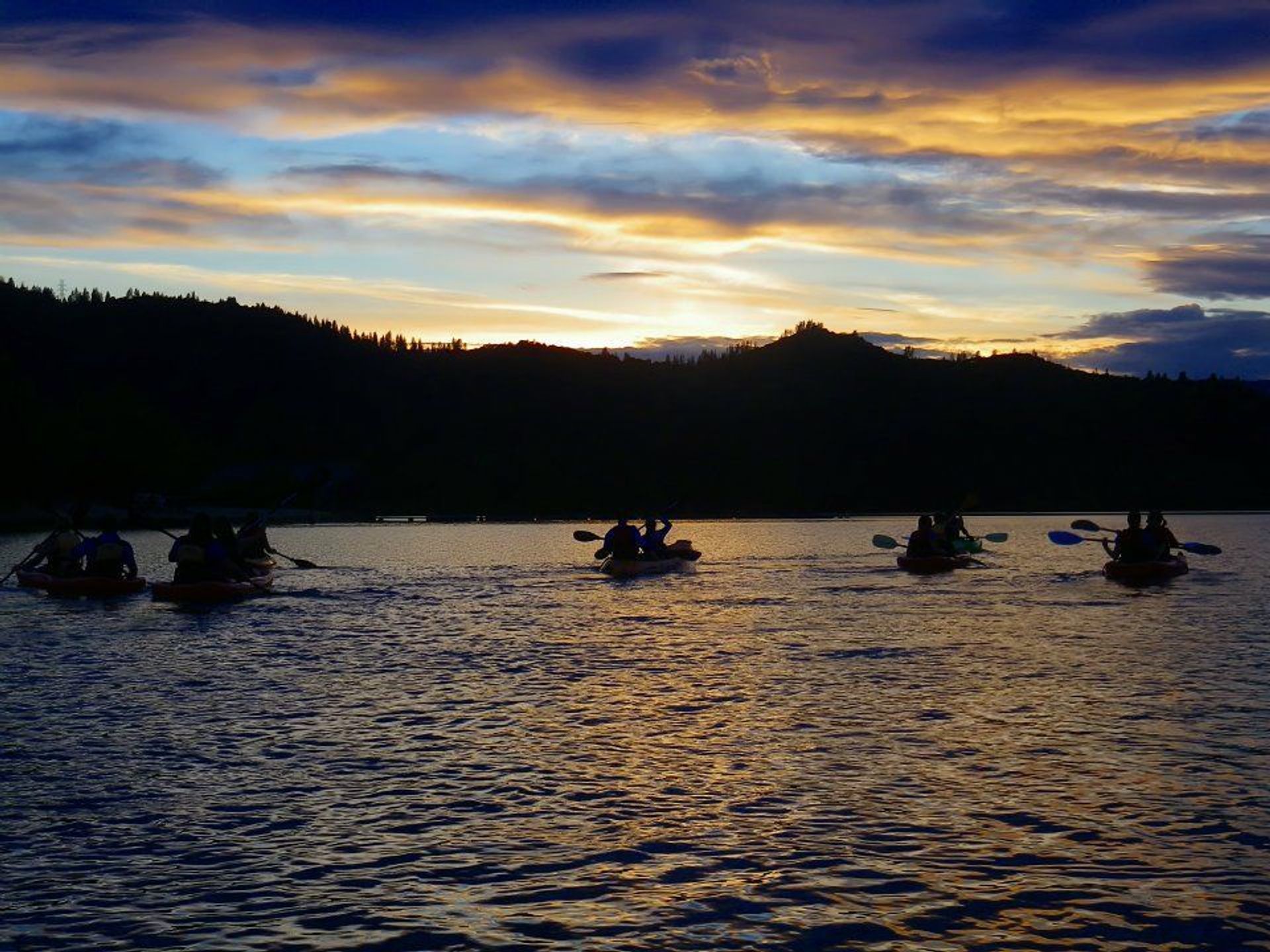 Thousands of vistors join interpretive rangers to get a new perspective of the lake on a moonlight kayak tour