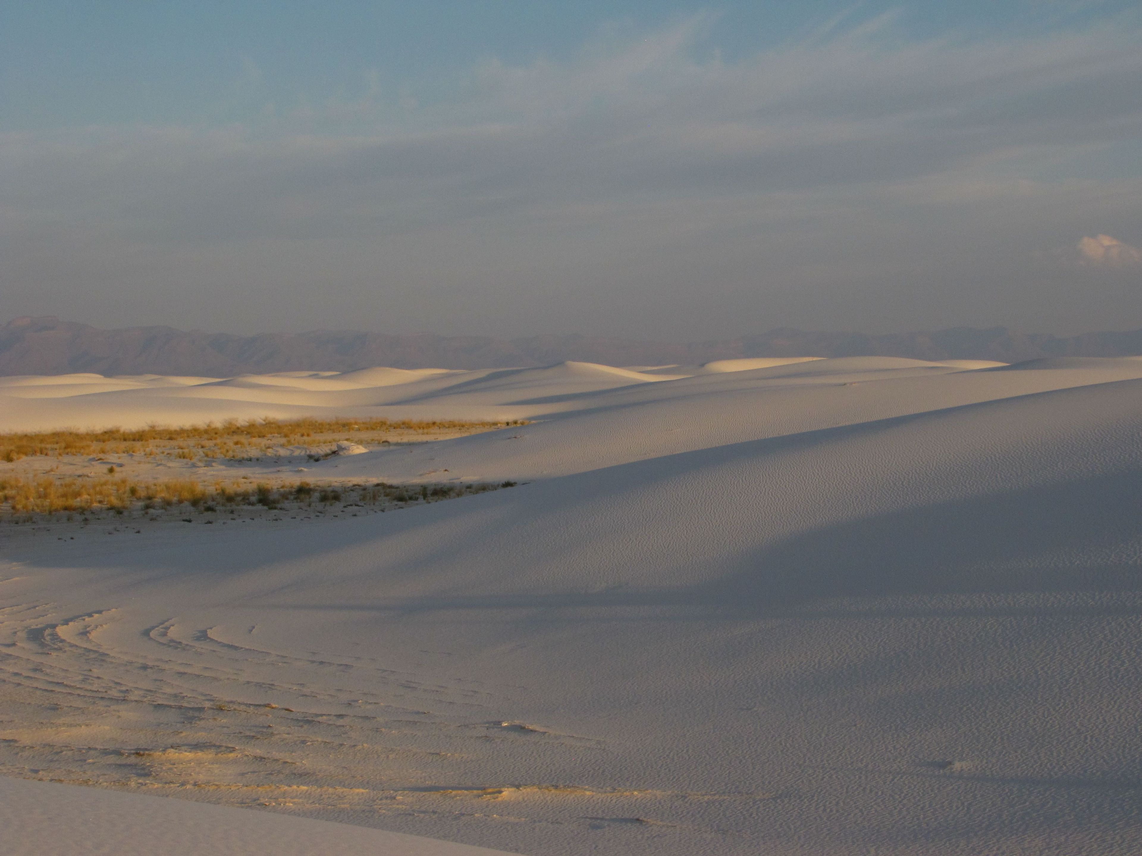 As the sun changes its angle through the sky it allows shadow to roll across the dunes.