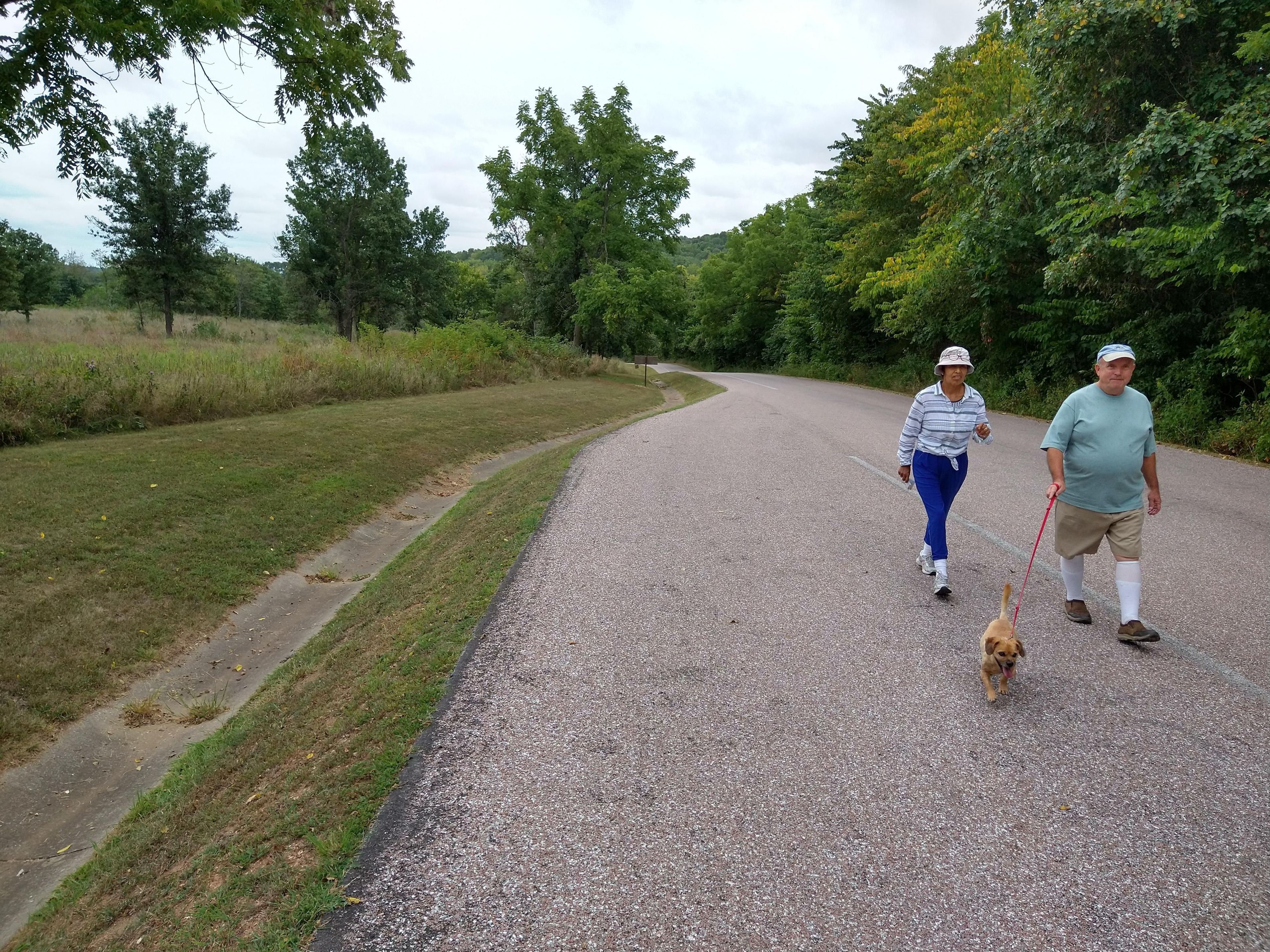 Visitors enjoy an evening stroll on the Tour Road.