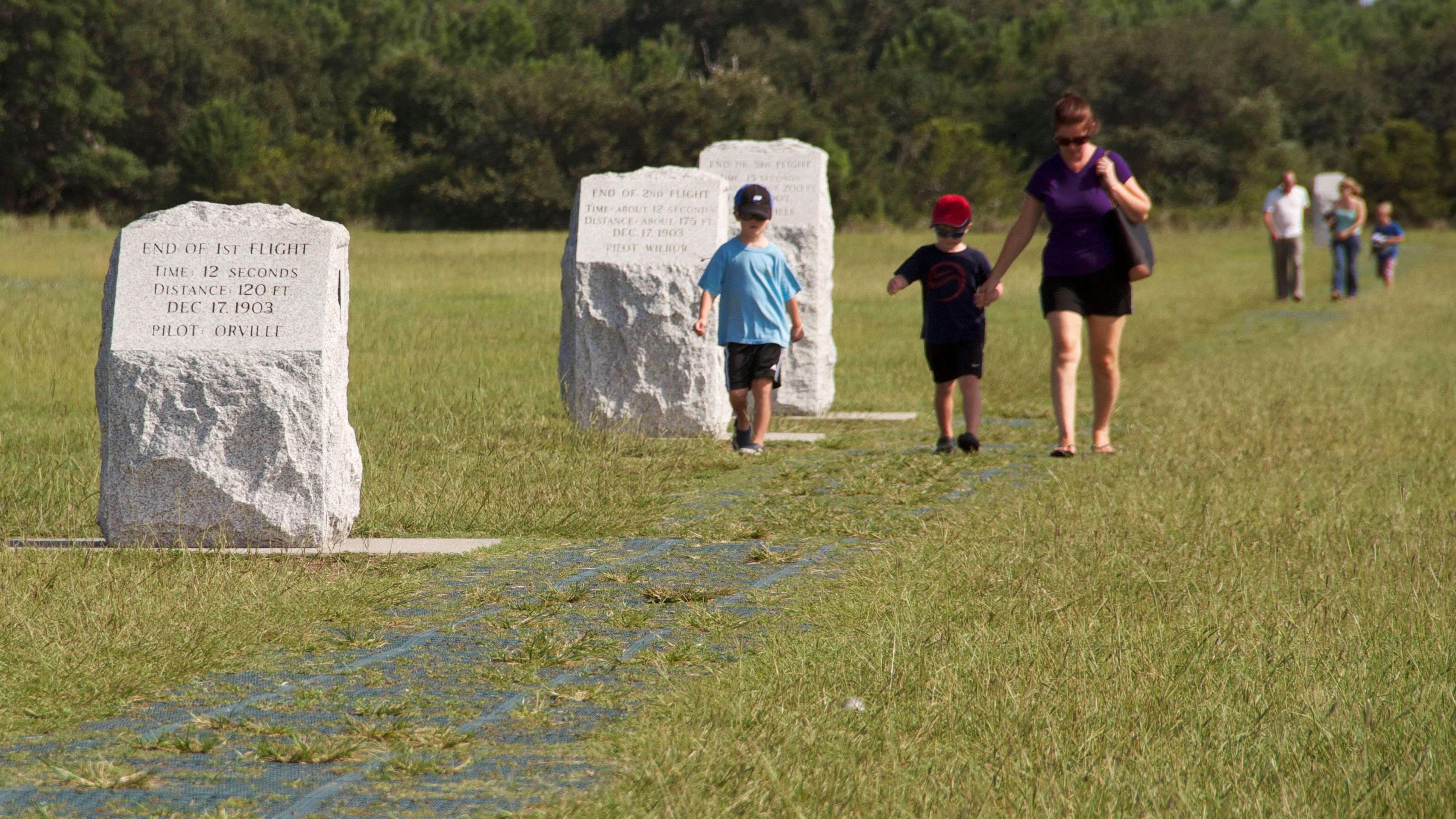 Visitors explore the landing spots of the Wright brothers' first flights.