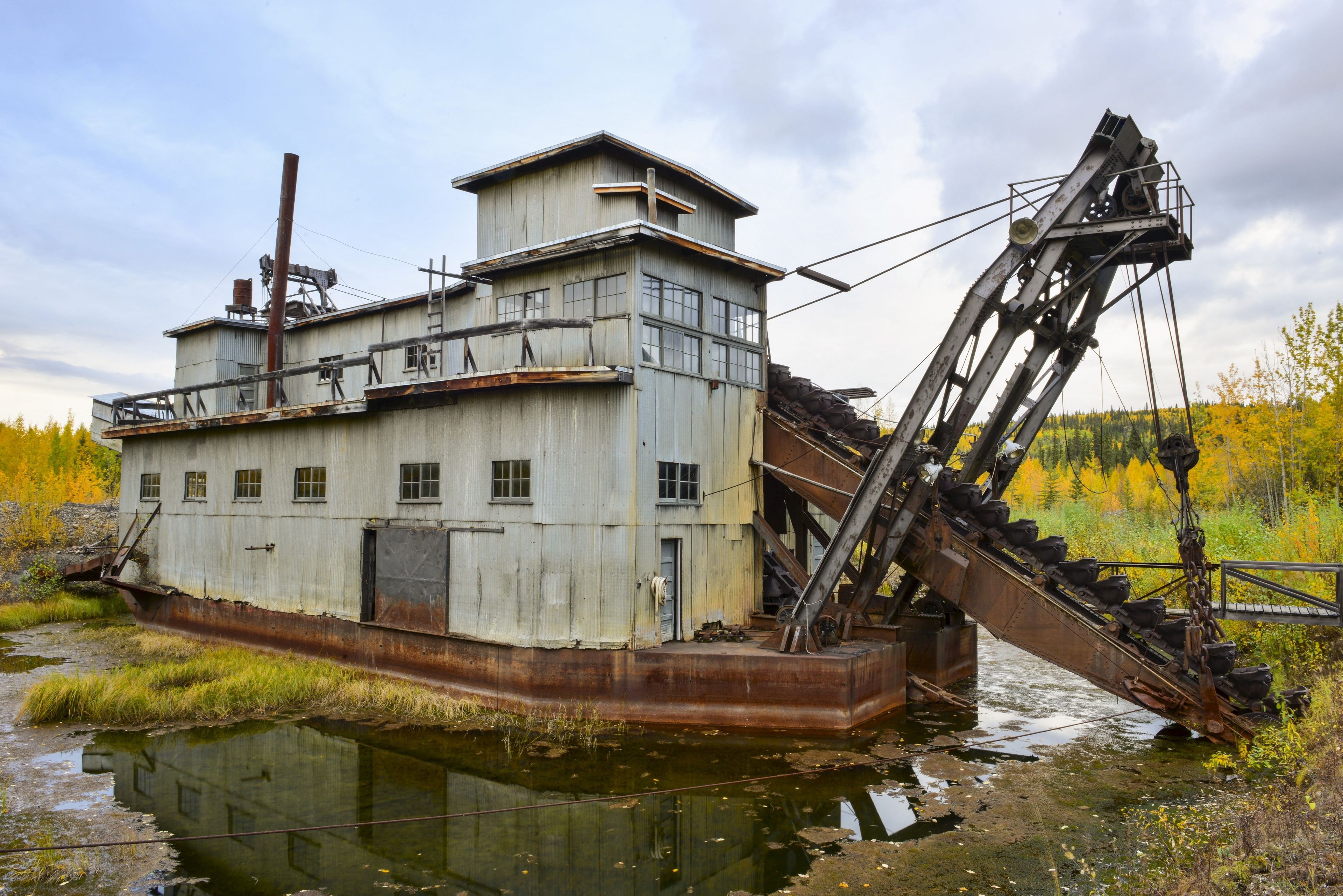 The historic Coal Creek Dredge sits nonoperational at its original site, near Slaven's Roadhouse