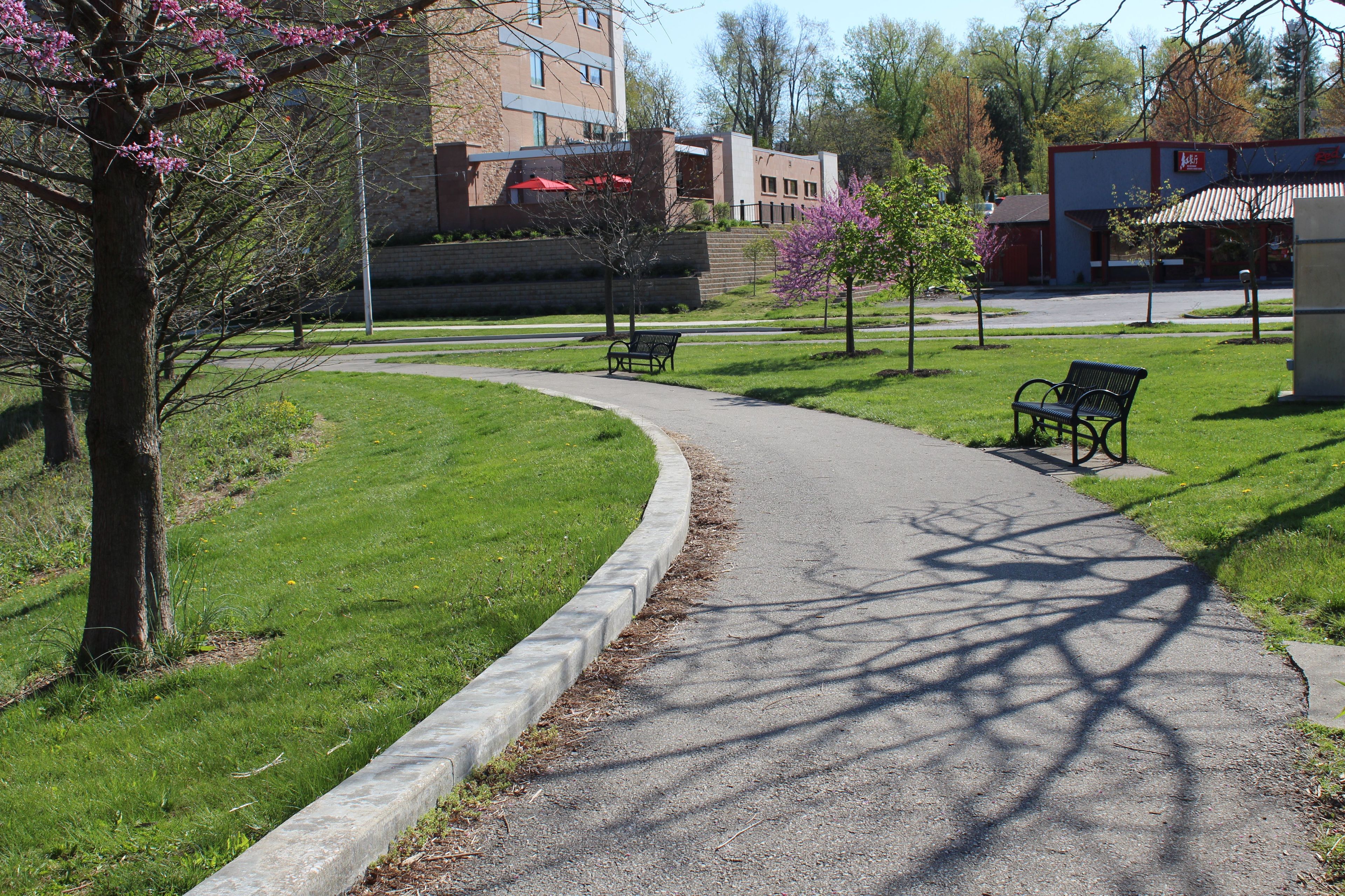 Paved Loop Trail with benches at Miller-Showers Park