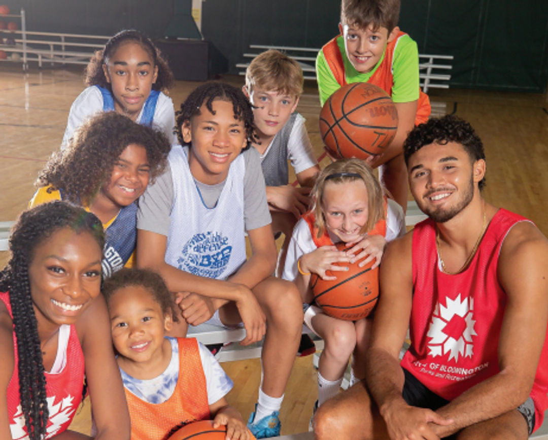 Photo of Youth Basketball Camp Participants with IU Athletes.